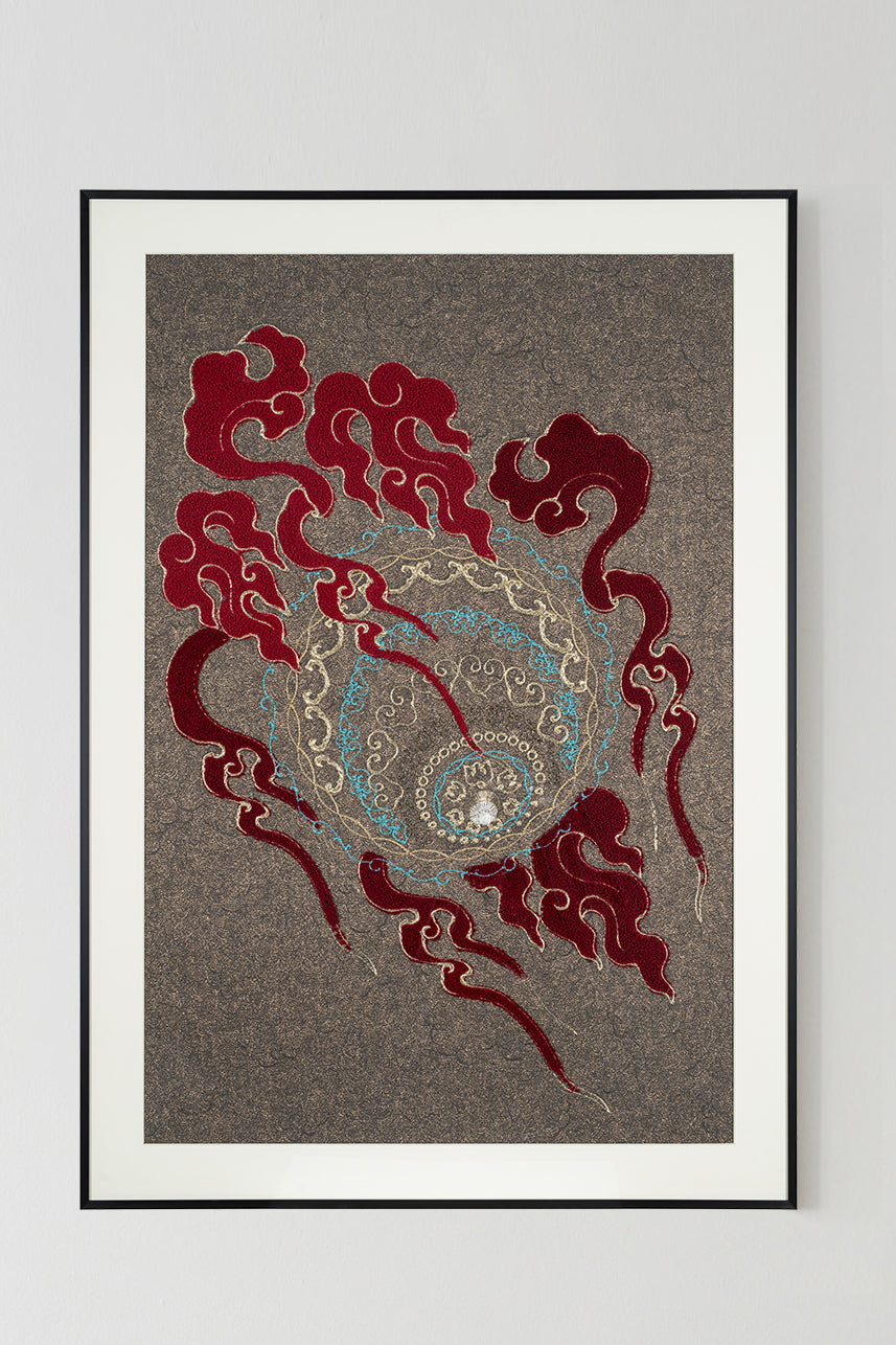 Framed embroidery artwork featuring a lion ball play design with intricate ball patterns.