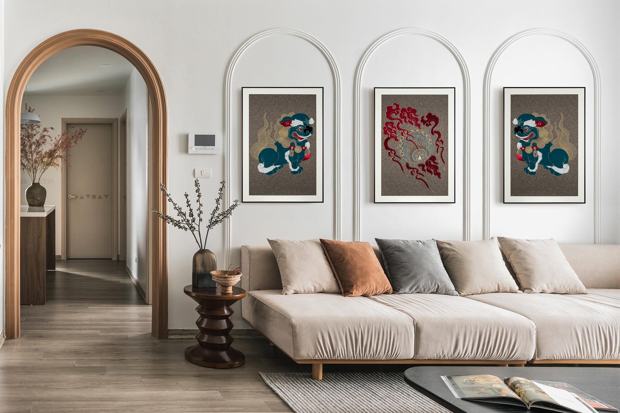 Modern living room showcasing a set of framed embroidery artworks featuring a lion ball play design, adding an artistic touch.