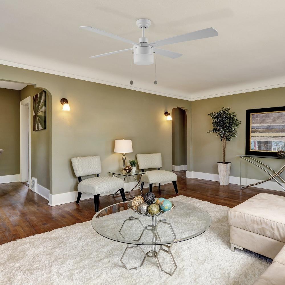 White ceiling fan with led light and pull chain in light-green modern living room.