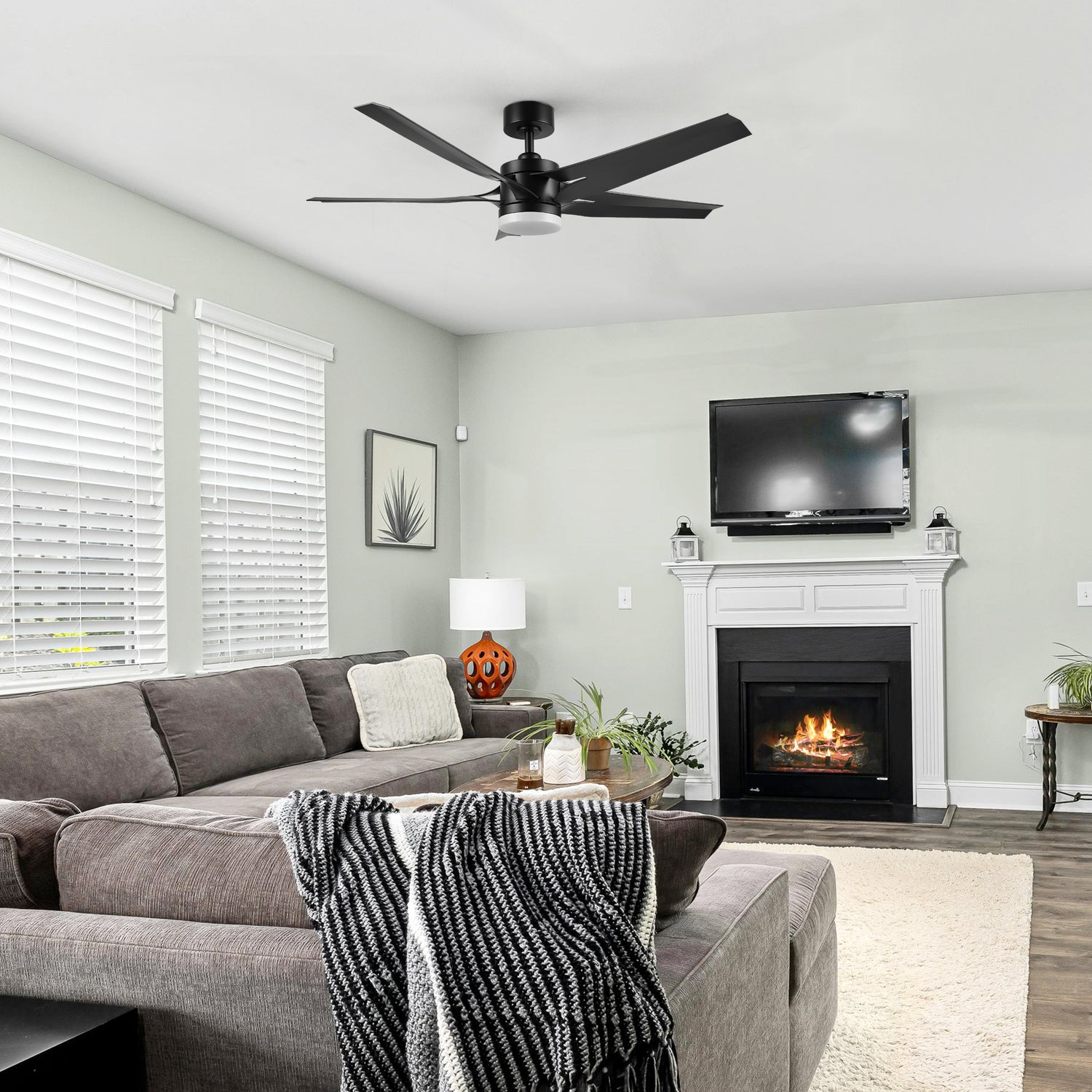 Araceli 52-inch DC ceiling fan with LED light and remote installed in a cozy living room setting, blending modern style with comfort.