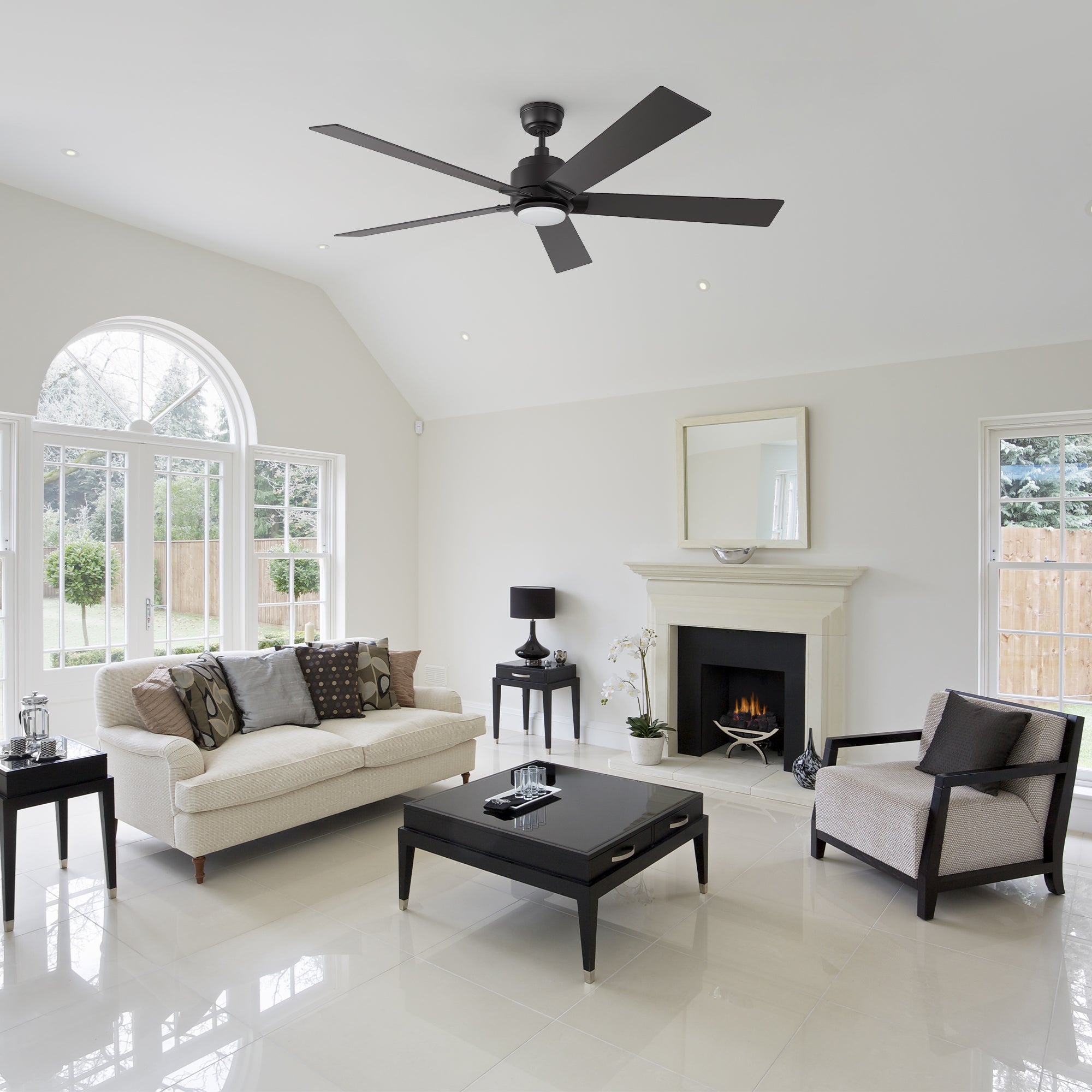 Modern living room with the Aspen smart ceiling fan in black, complementing a clean, elegant interior with quiet and efficient cooling.