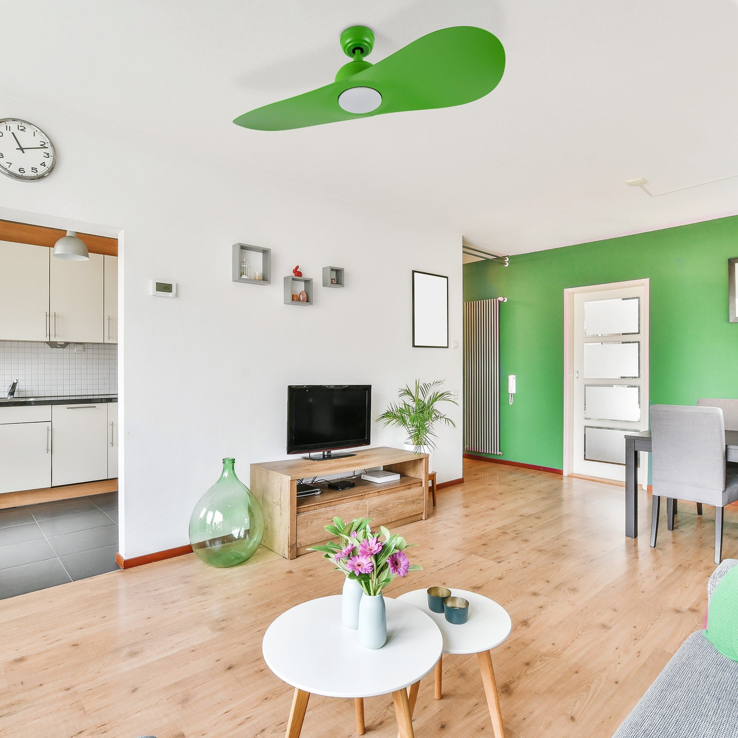 Azure modern smart ceiling fan with LED light and remote control, shown in a unique and vibrant green living room design.