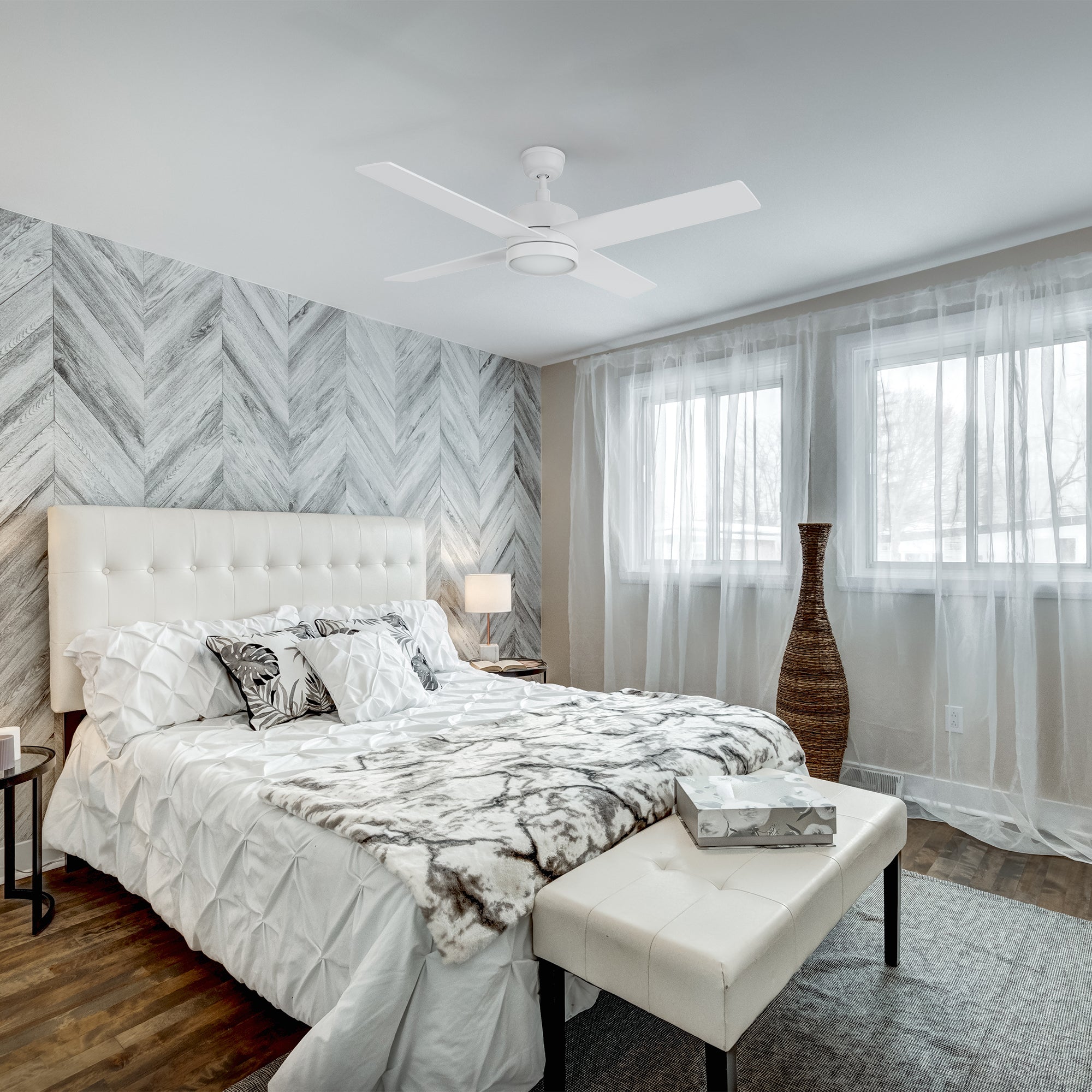 Smafan Rossendale 52-inch white ceiling fan with LED light in a modern bedroom featuring a white bed, neutral tones, and soft natural light.