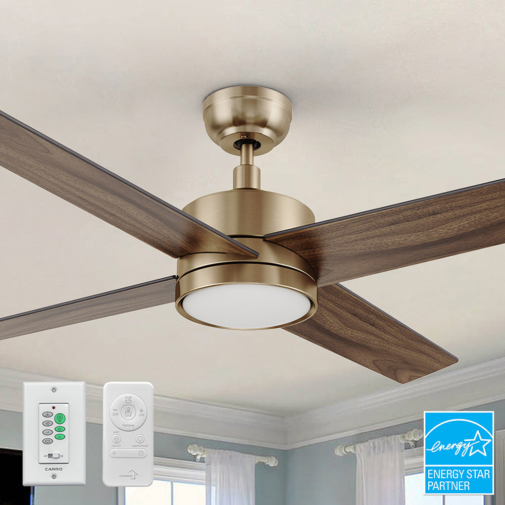Close-up of the Carro Smafan Rossendale 52-inch ceiling fan in brushed gold, shown with a remote and wall switch for control.