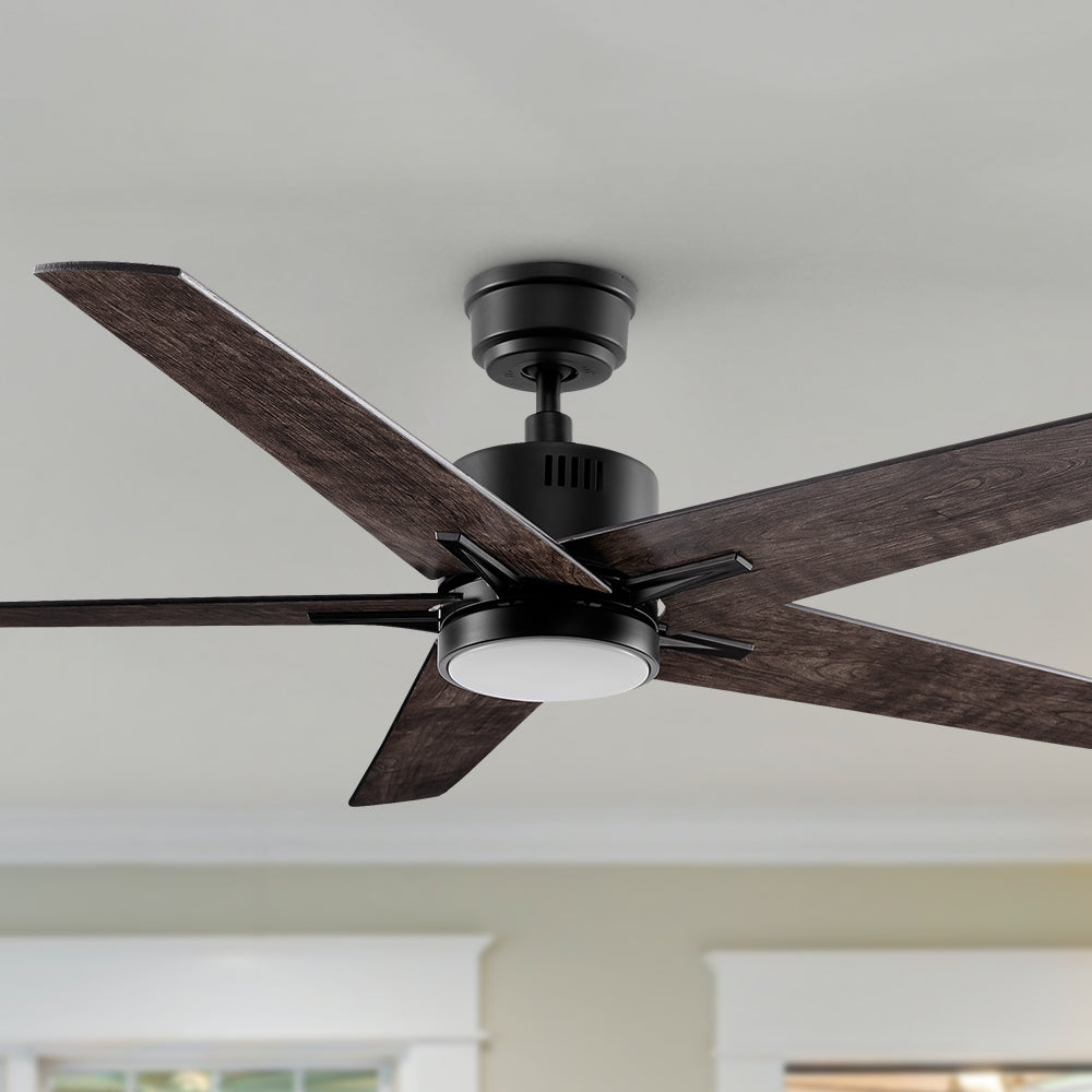 A modern 52-inch ceiling fan featuring five wood-finish blades and a sleek black motor housing, suspended from a black downrod. Designed for contemporary and industrial-style interiors.
