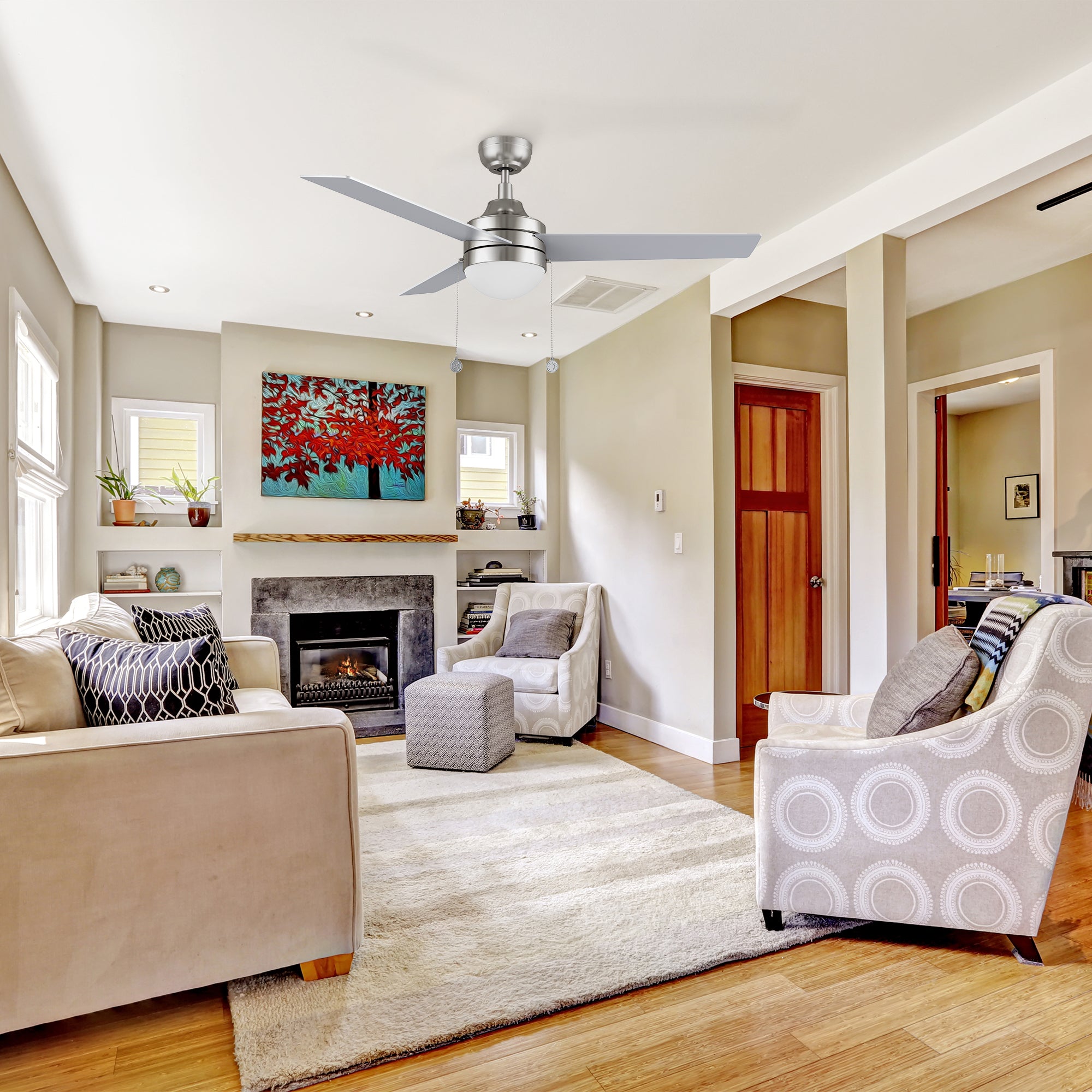 In modern living room, there is best 5 speed DC motor ceiling fan with dimmable LED light and pull chain, featuring with brushed nickel finished Fan Hub design. This is the combination of traditional classic LED ceiling fans and modern interior design, making people comfortable and full of beauty in the home.