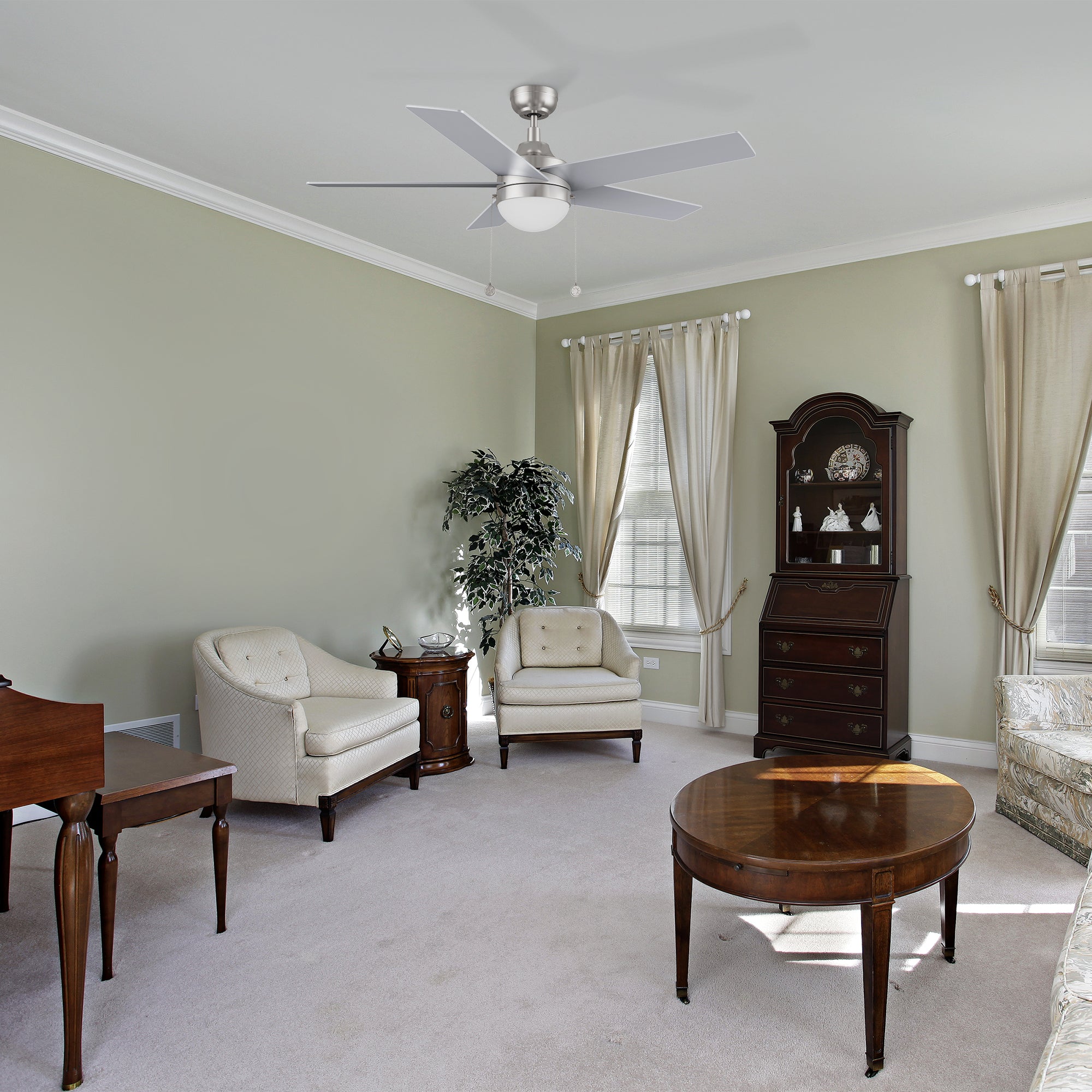 52 inch Modern ceiling fan with lights and five blades matches well with the living room where the walls are dominated by light green.