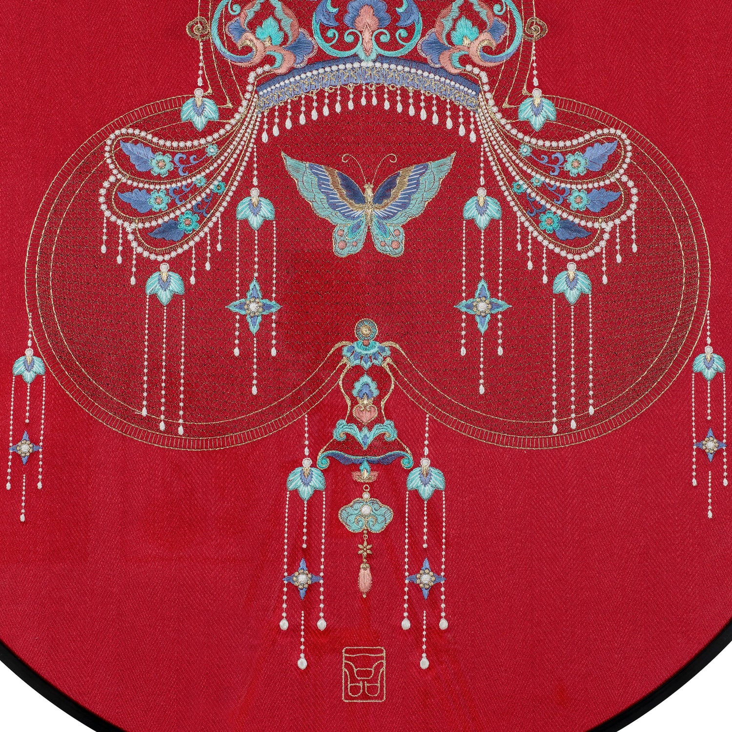An Oriental embroidery art work embroidered with a phoenix crown.