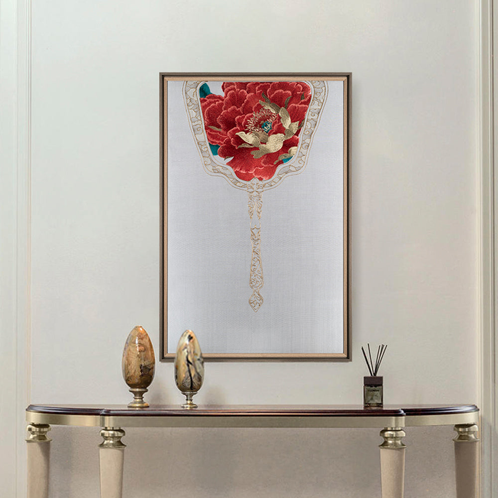 Hung over the side table as a wall art, this work of art is embroidered with a royal fan, and the royal fan is embroidered with red peony flowers symbolizing nobility.