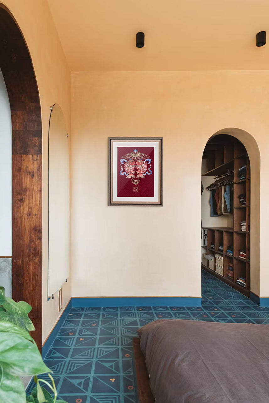 An embroidered artwork with double koi fish hangs on the study gallery.