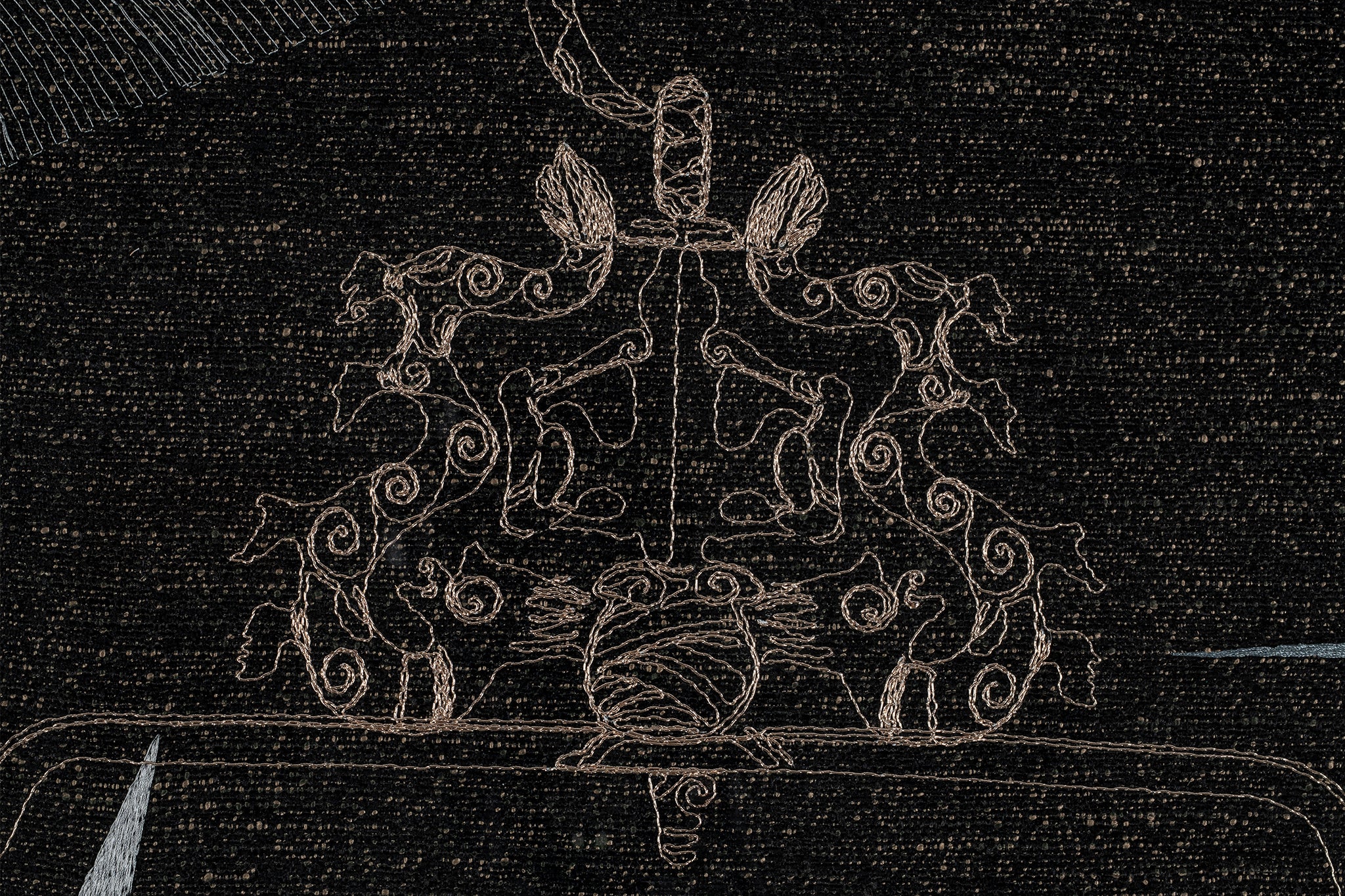 The embroidery threads details of bird perch top.