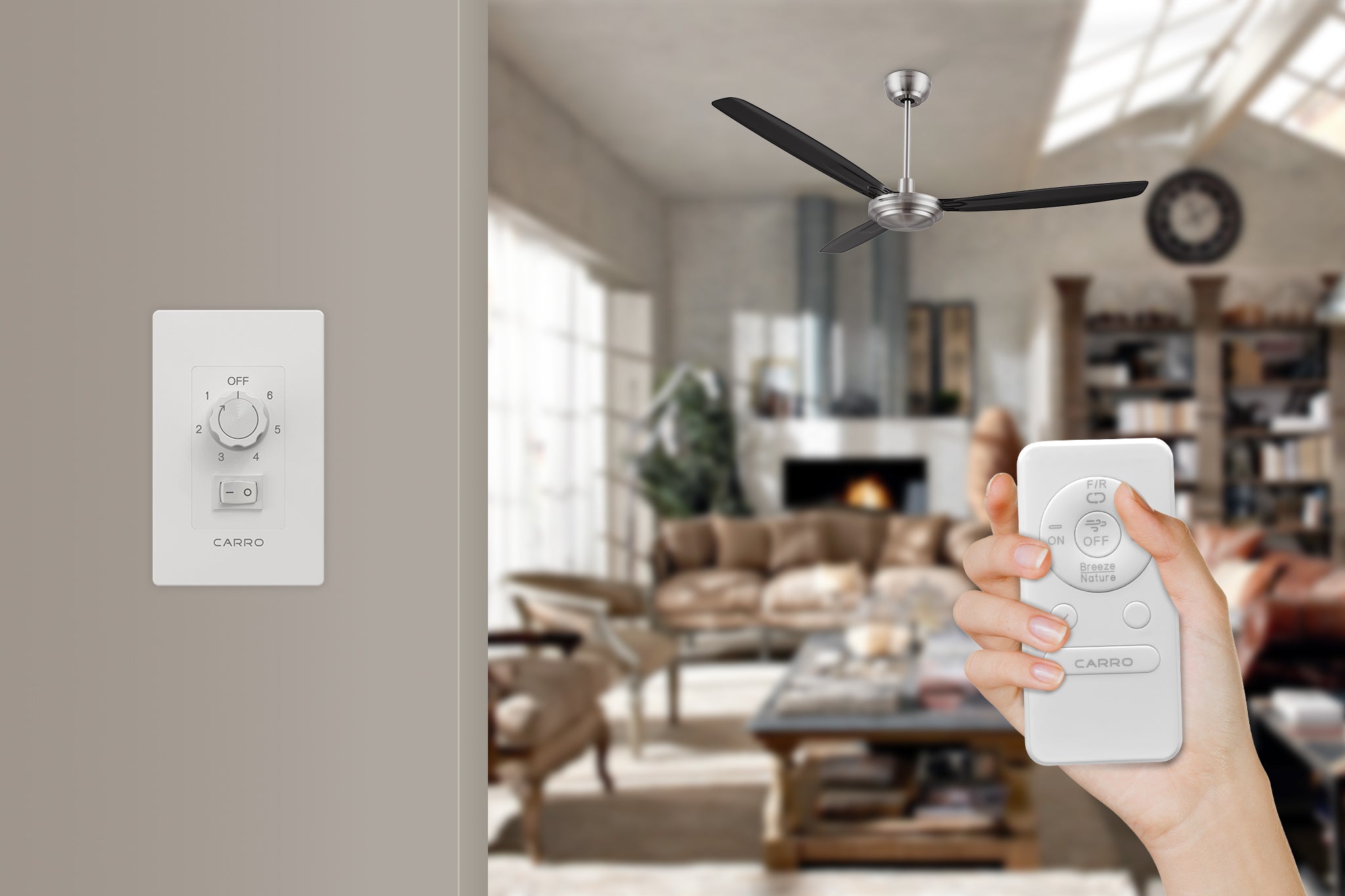 A great room featuring a Kade 56-inch ceiling fan with a remote and wall switch control. The wall switch on the left side shows settings for fan speed (1-6) and a light switch labeled "CARRO." The remote control in a hand on the right side has buttons for power, fan speed adjustment, and modes like "Breeze" and "Nature," also labeled "CARRO."