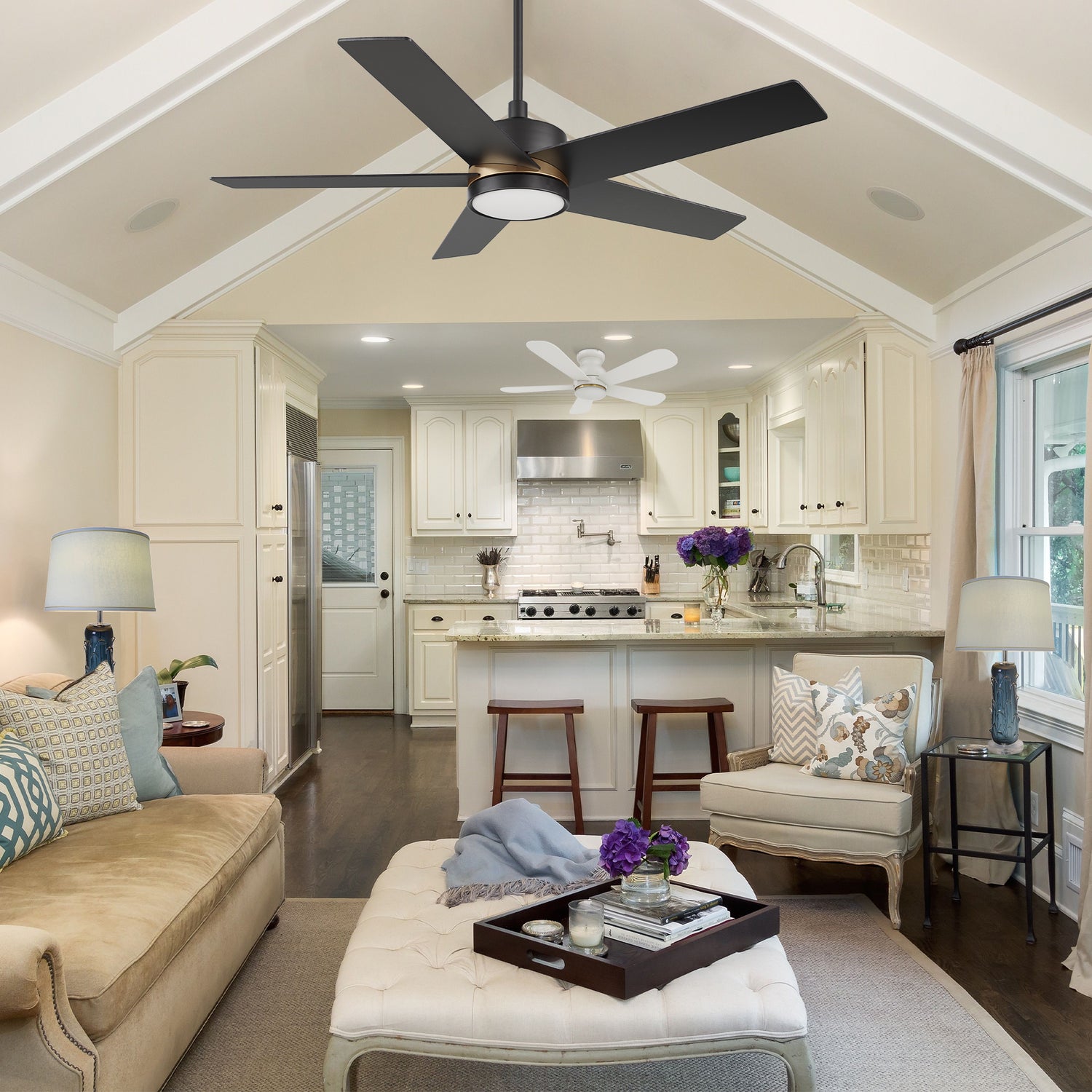 flush mounting white ceiling fan designed in the kitchen and black downrod mounting ceiling fan matches the white modern style living room.
