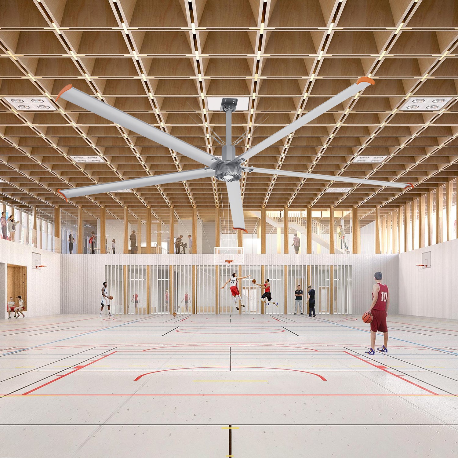 Makani 14ft industrial HVLS ceiling fan installed in a gymnasium, circulating air to create a comfortable environment for athletes and spectators in a spacious indoor sports facility.