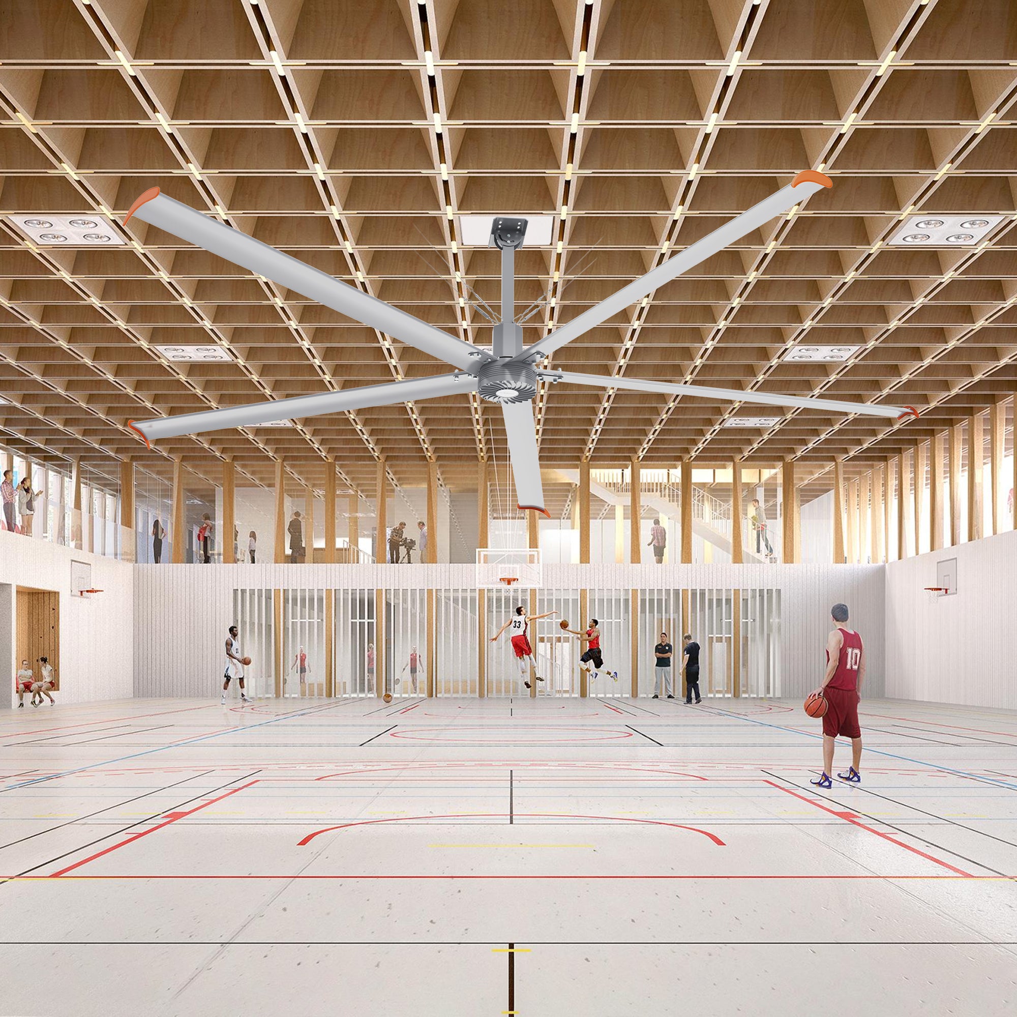 Makani 14ft industrial HVLS ceiling fan installed in a gymnasium, circulating air to create a comfortable environment for athletes and spectators in a spacious indoor sports facility.