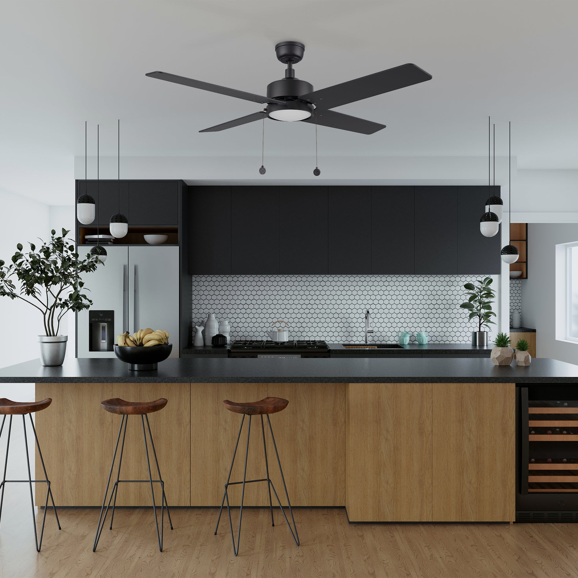 The Nazzano 52-inch DC motor ceiling fan with LED light, installed in a modern kitchen with black and wooden elements, adding a sleek and functional touch to the space.