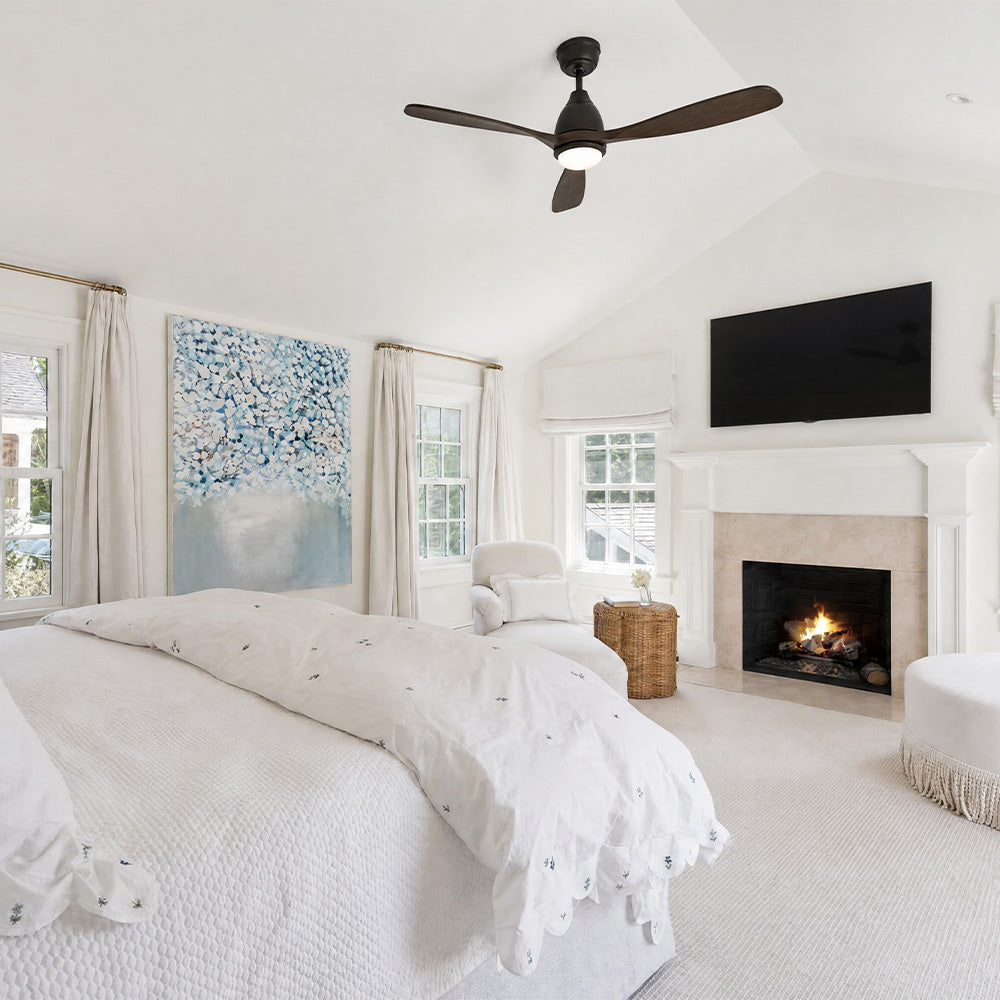 Complete your serene, vaulted-ceiling master bedroom with a whisper-quiet wood ceiling fan with light. Perfectly blending modern technology with airy, coastal elegance.