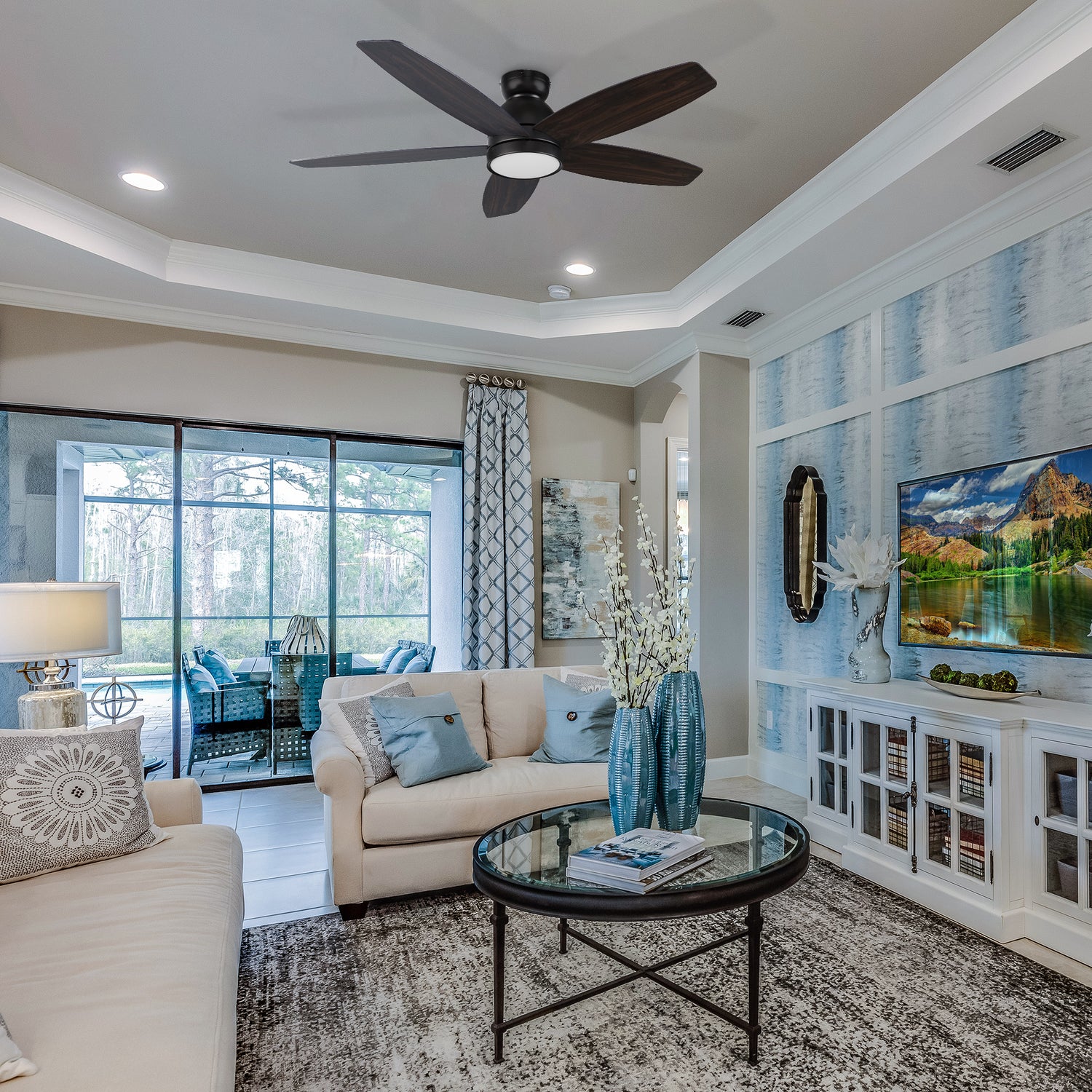 The Povjeta 52" low profile ceiling fan in black will keep your living space cool, bright, and stylish. This soft modern masterpiece is perfect for indoor living spaces.