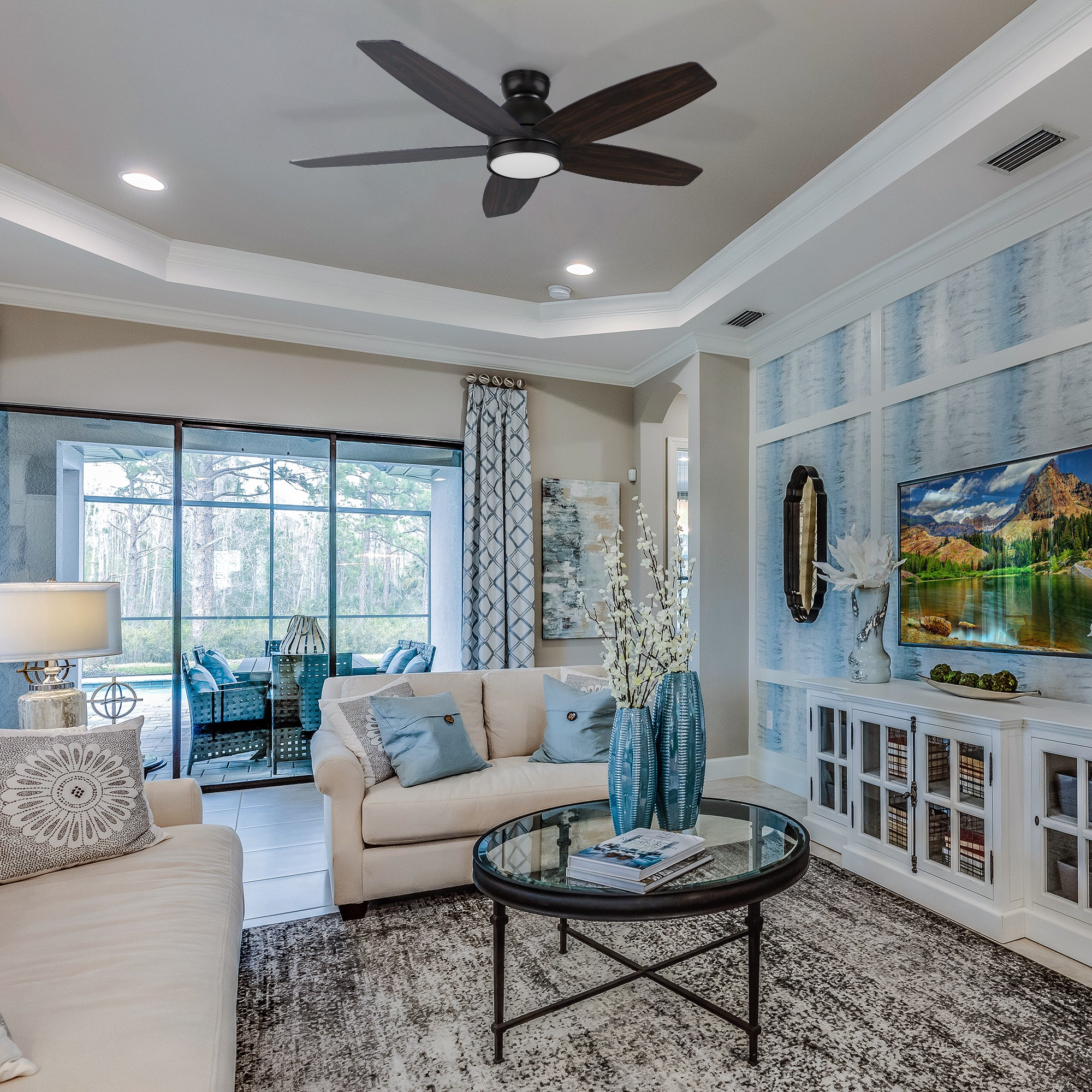 The Povjeta 52" low profile ceiling fan in black will keep your living space cool, bright, and stylish. This soft modern masterpiece is perfect for indoor living spaces.