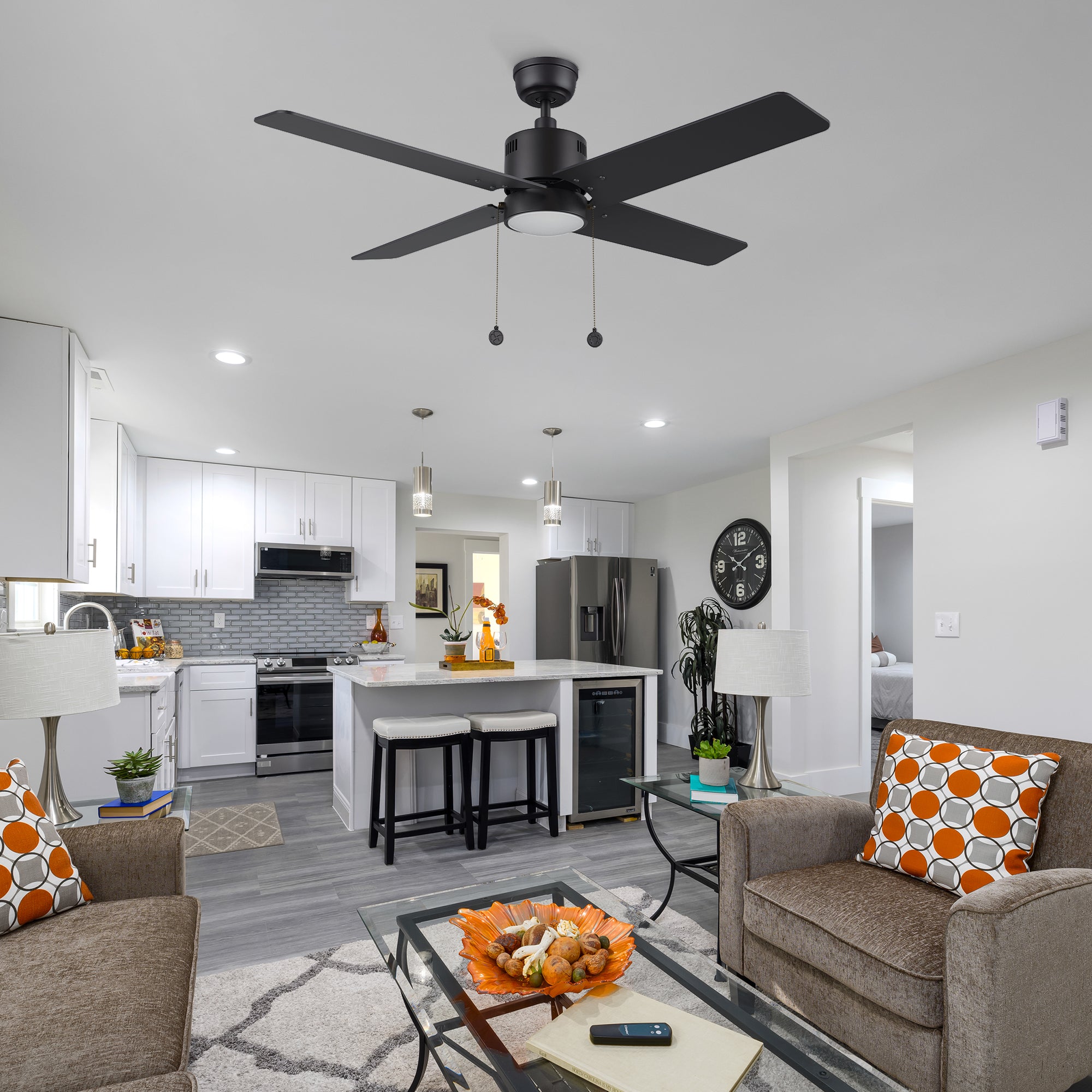 Carro Smafan Rowan 52 inch modern ceiling fan with LED light in a black finish, displayed in a living room setting.