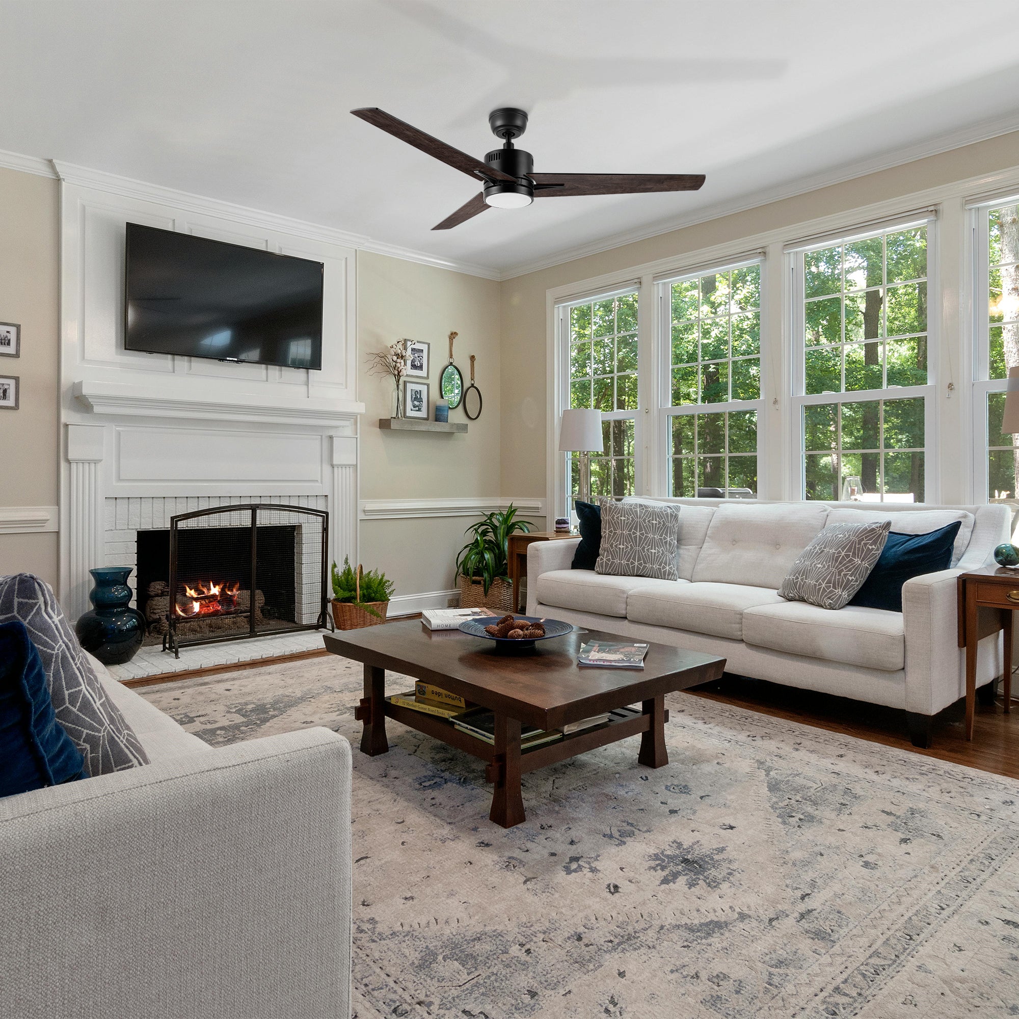 Large 52-inch Skobeloff ceiling fan with integrated LED light, perfect for elegant living rooms, providing quiet airflow and modern design.