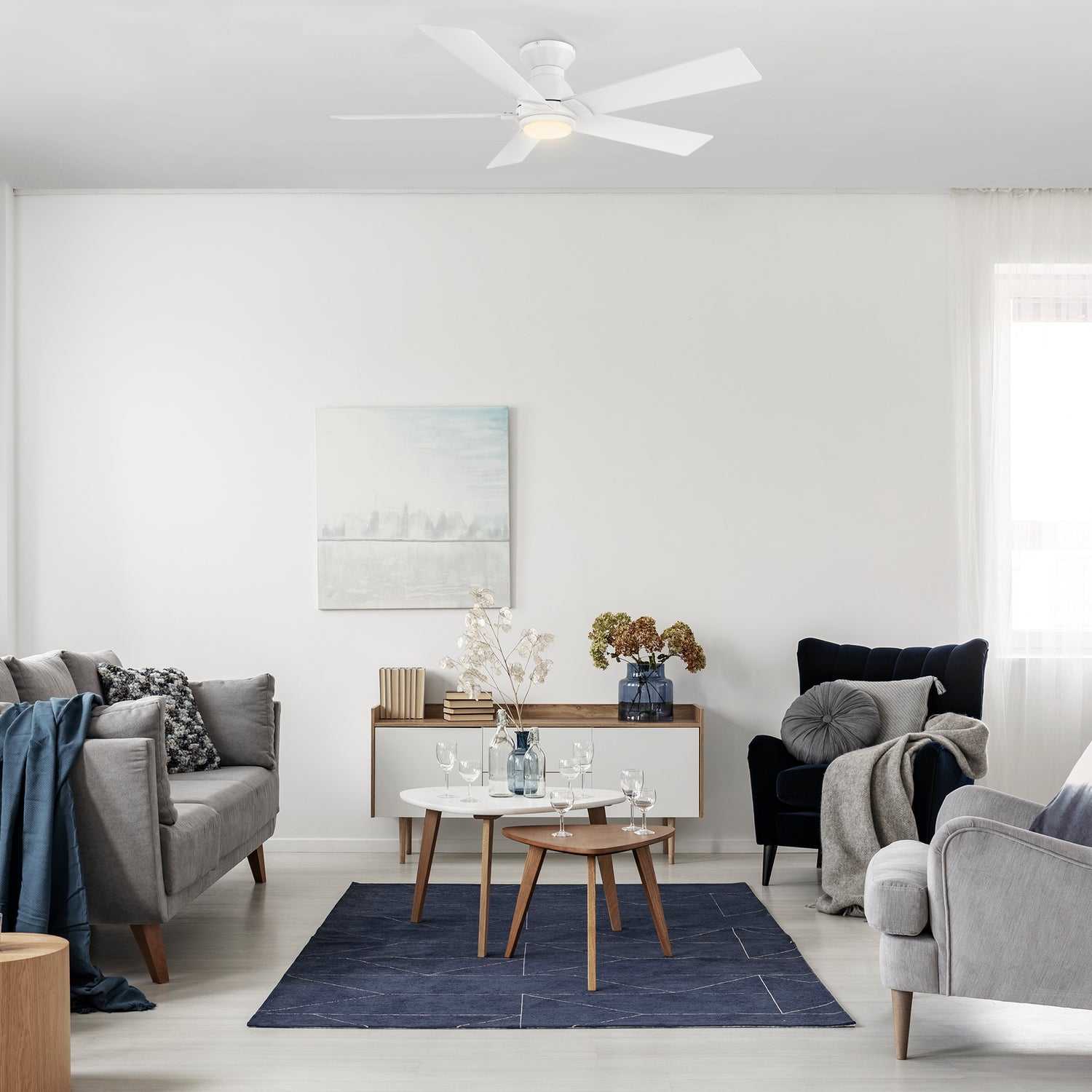 Carro Armoy 52 inch flush mount remote control ceiling fan with light, 5 blades, white design, decor in a livingroom.