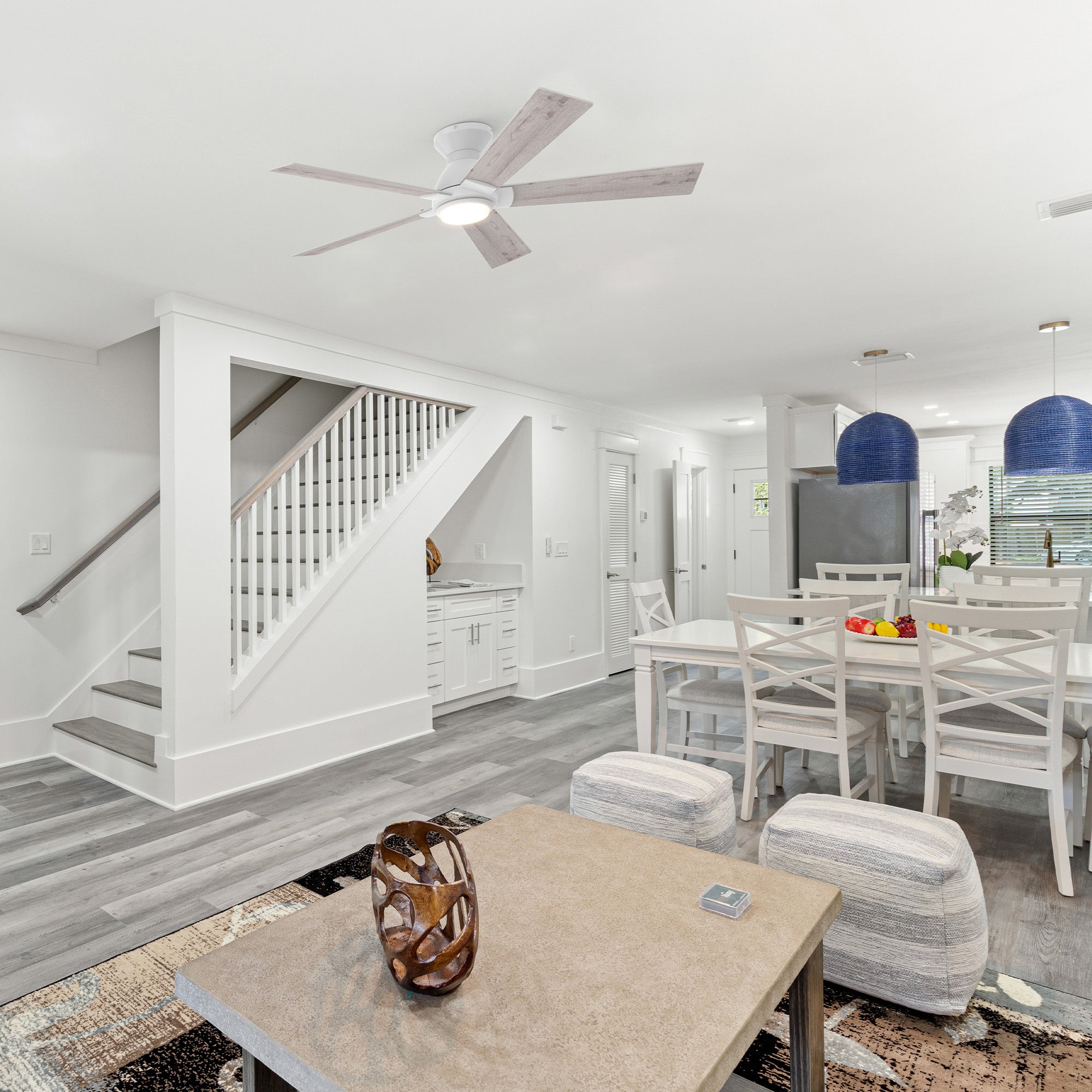 Carro Armoy 52 inch flush mount remote control ceiling fan with light, 5 blades, white design, decor in a livingroom.