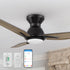 Close-up of the Smafan Carro Brooks 2 Smart 48-inch outdoor ceiling fan with a flush mount design, black motor housing, and wood finish blades. Includes remote control, wall control, and smartphone app compatibility shown below.