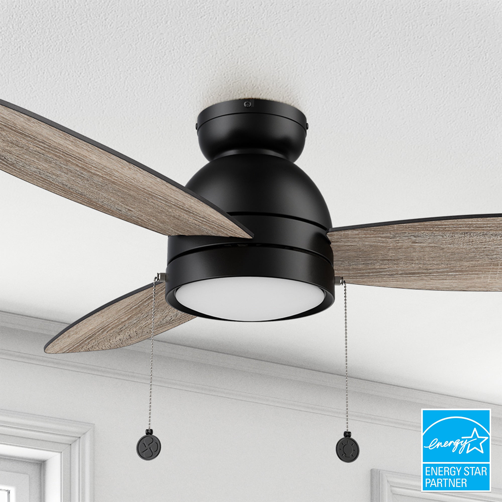 Carro Tesoro 52 inch Pull-Chain Ceiling Fan with flush mounted, designed with wooden exterior, elegant plywood blades, and a charming LED light cover.