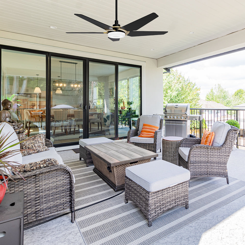 Carro Voyager 52 inch outdoor ceiling fan with light, black and gold design and an extended 6 in rod, Installed in the house proch.