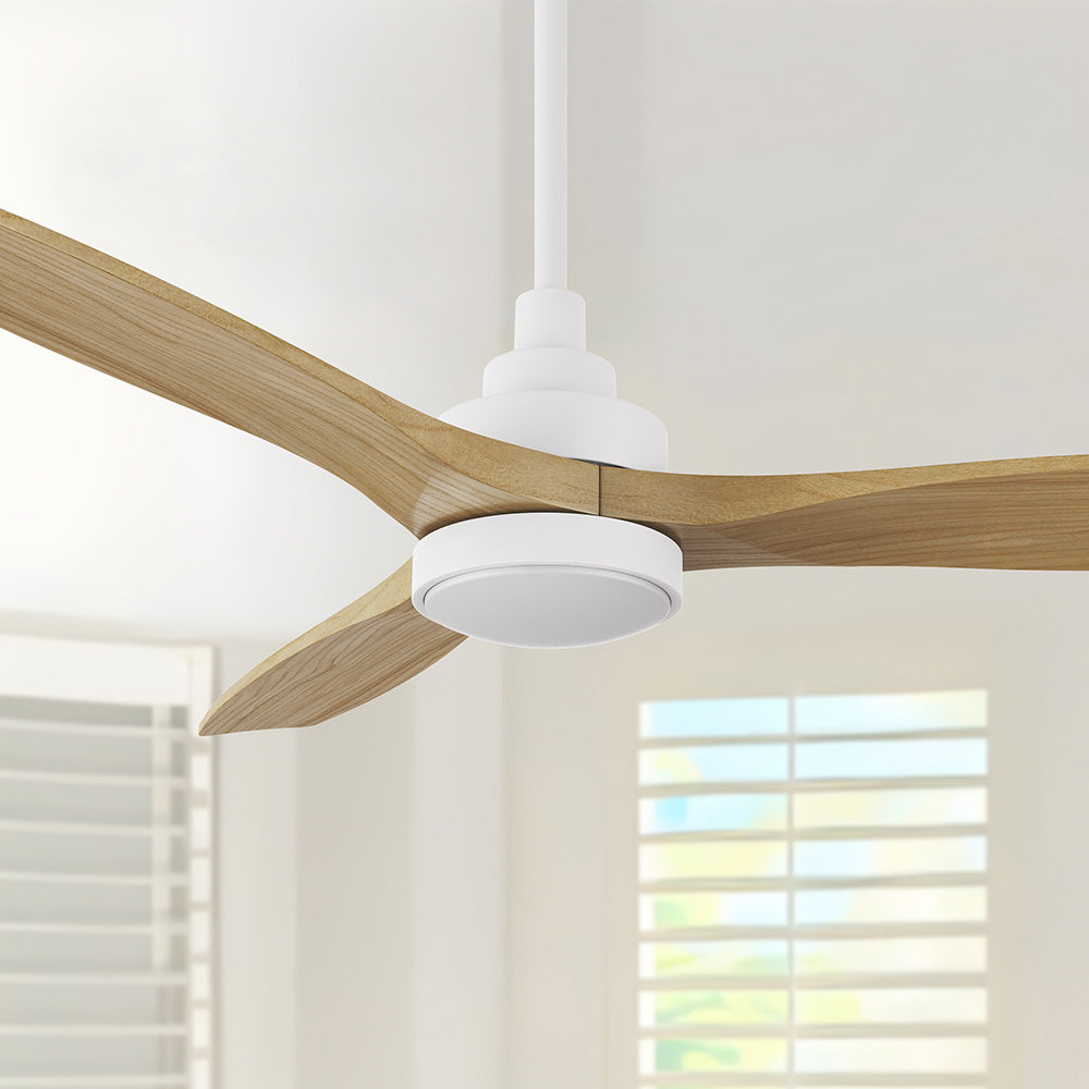 Close view of Ultiem 48-inch ceiling fan in light-wood finish with three sculpted blades, short downrod, and round integrated LED light, shown against a neutral wall with window blinds.