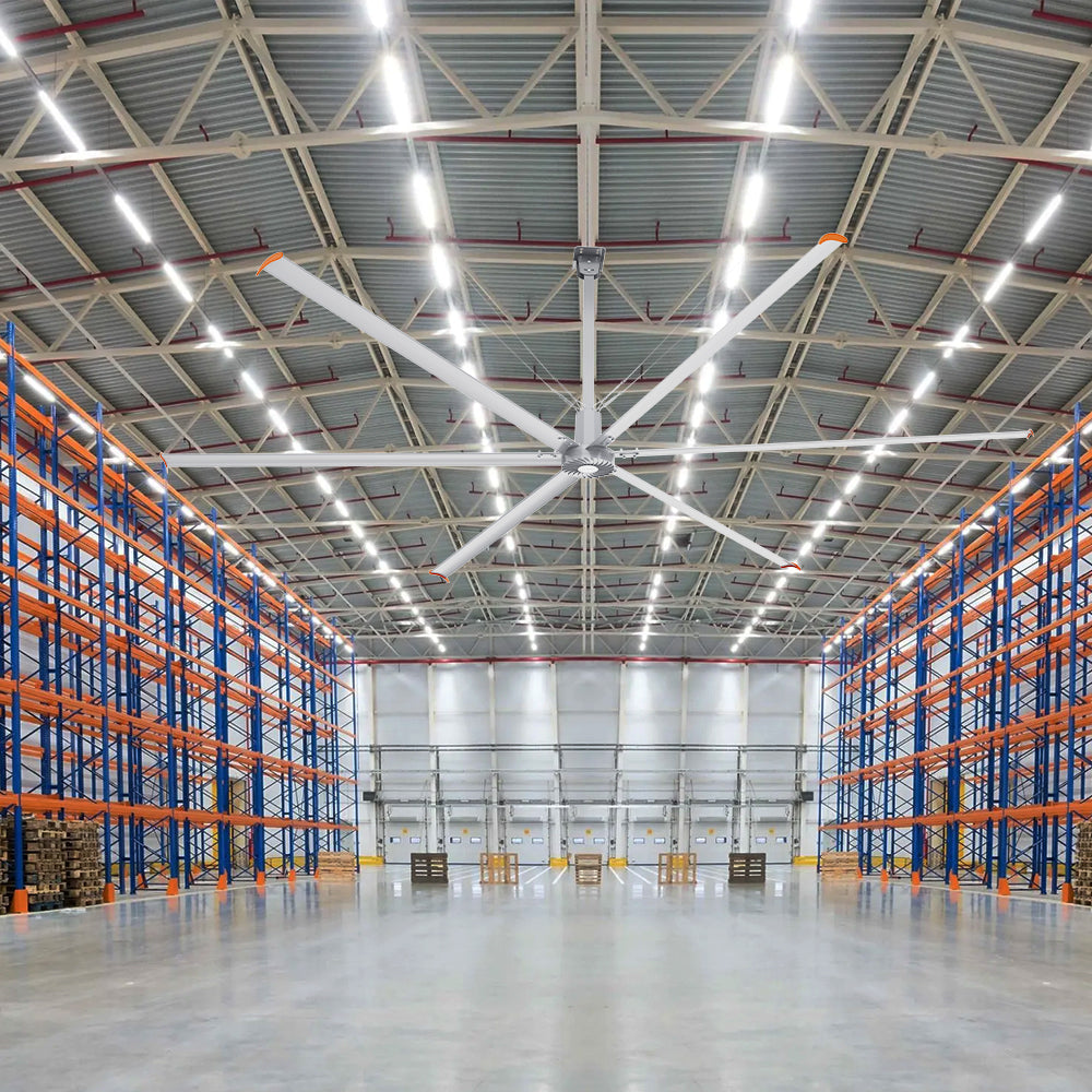 22ft Industrial fan mounted on the ceiling of an empty warehouse.