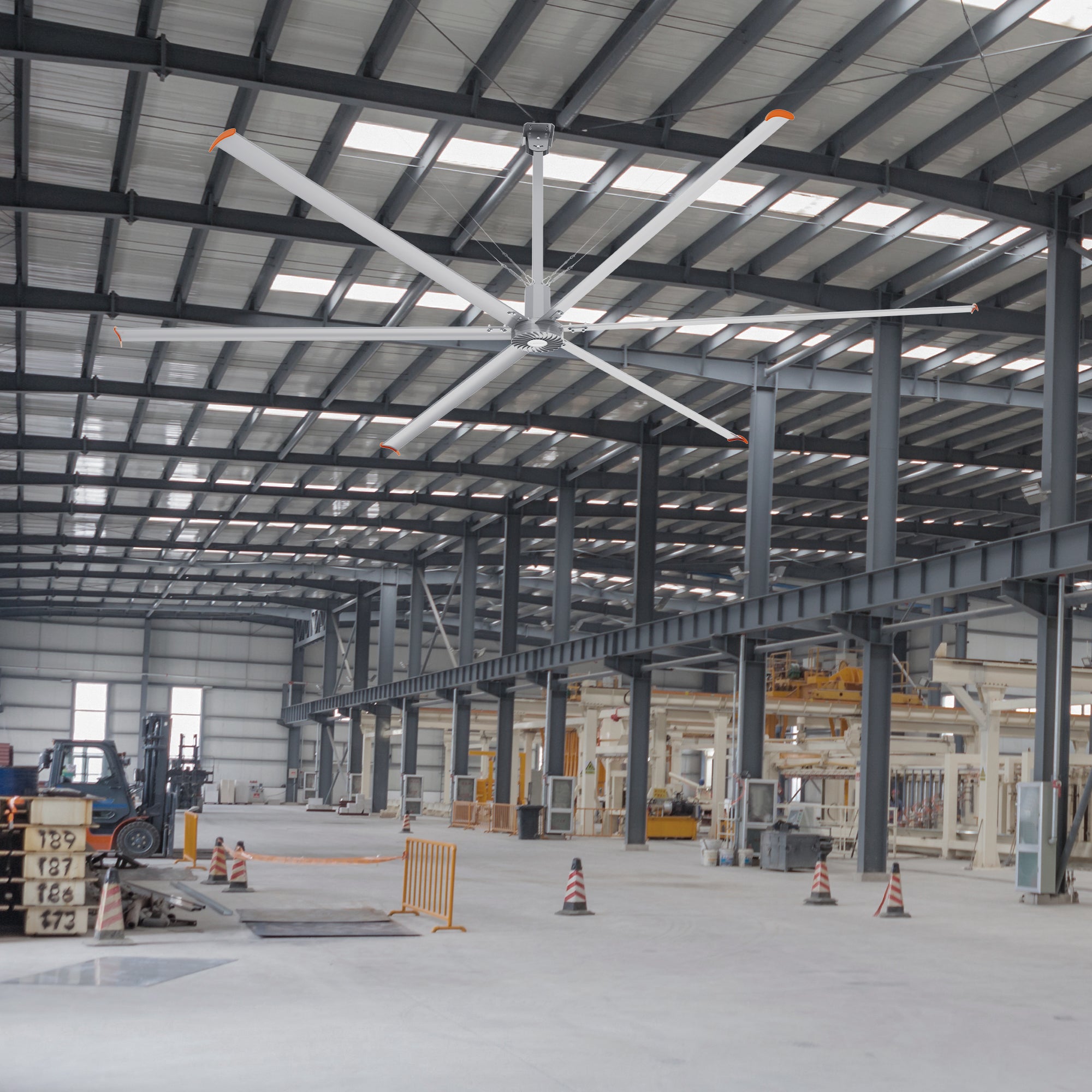 Visby 22-foot industrial ceiling fan installed in a large factory, providing efficient air circulation in the spacious industrial setting.