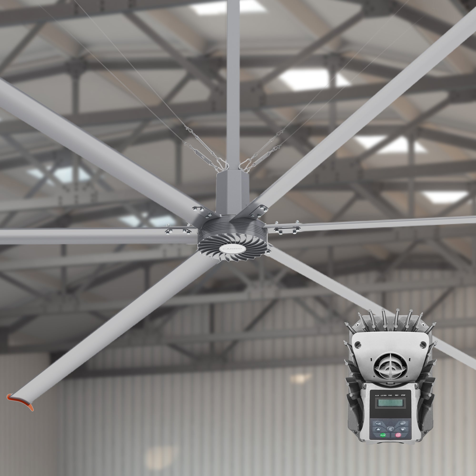 24ft industrial fan in silver with wire wall controller and steel rope traction device.