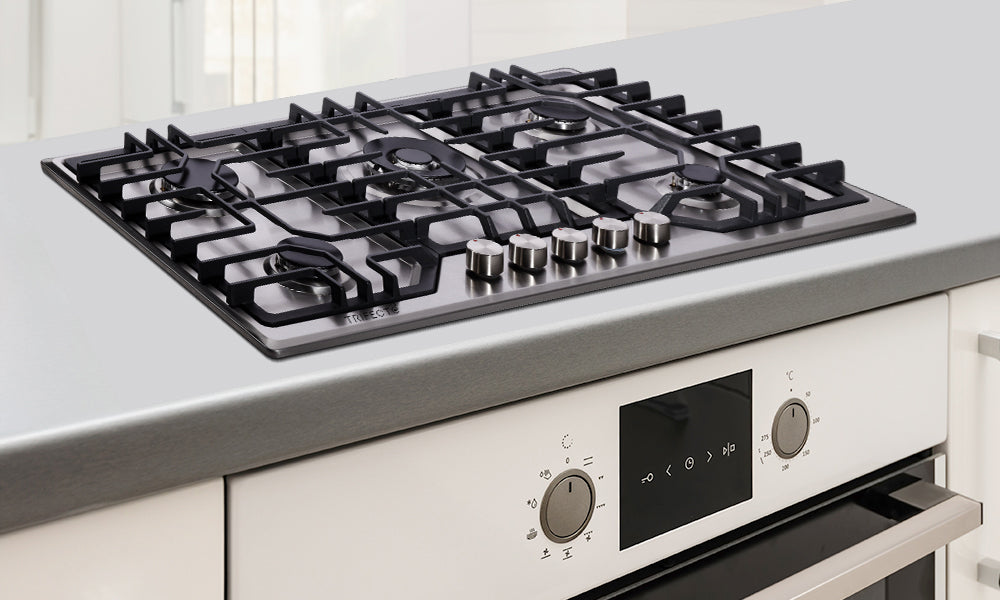 Modern luxury stainless steel gas cooktop at the kitchen cooktop counter.