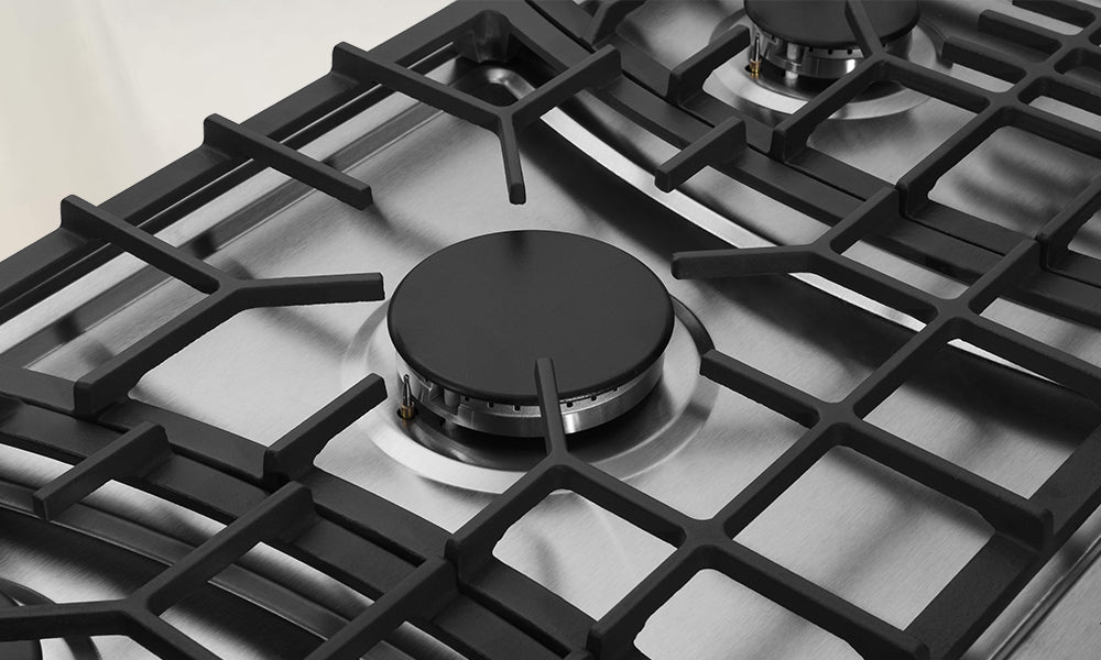 A picture shows the details about the Ignition bottom of the gas stove cap
