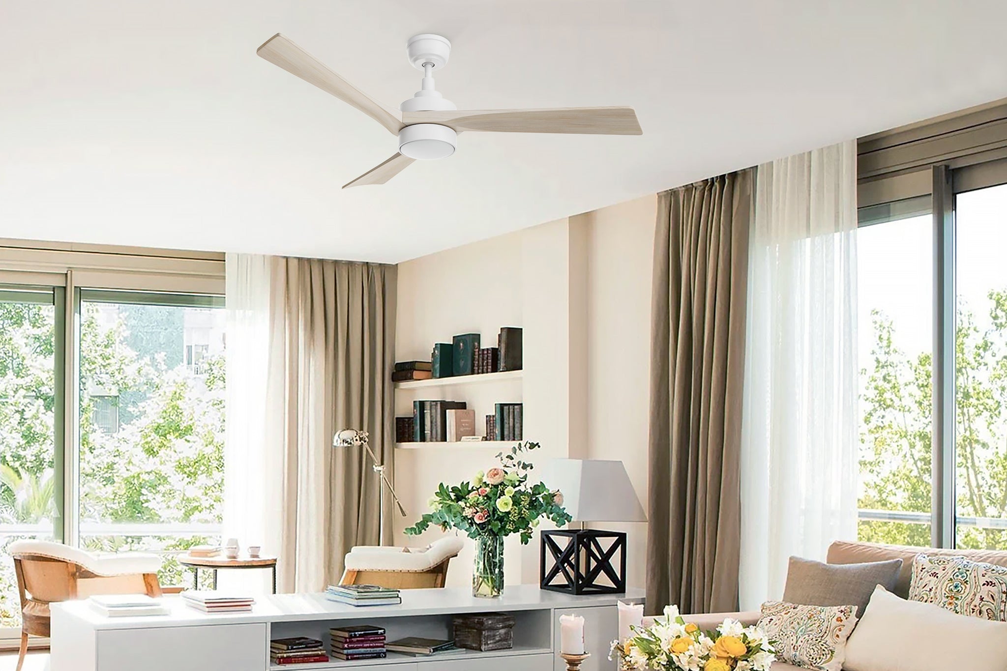 White solid-wood blade ceiling fan matches with two beautiful bouquets of flowers, and dark brown, white floor curtains, making the interior look more natural.