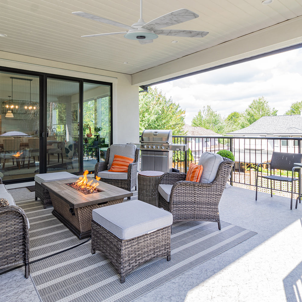 Smafan Striker 56 inch outdoor ceiling fan with white fan blades design, and an 6/12 in extended rod, mounting in a outdoor patio.