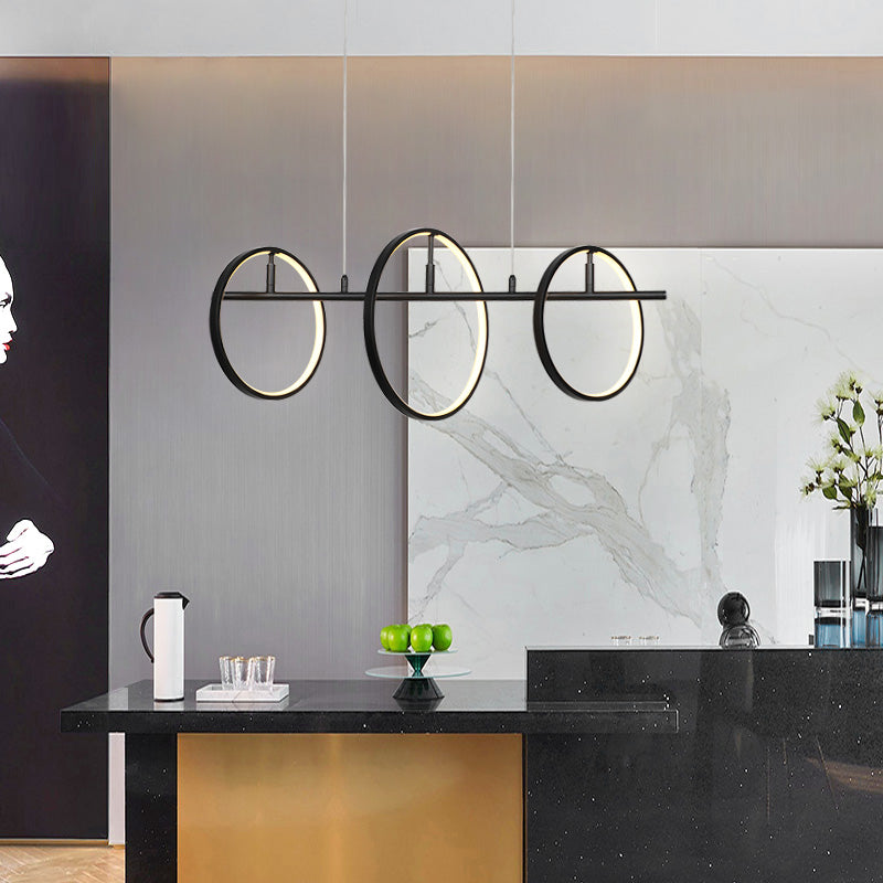 Smafan Abbey Modern Creative LED Chandelier Pendant Light,this black 3 light LED hanginig light with geometric integrated into the design,using simple circles to outline the most spiritual space,everywhere has a simple and extraordinary fashion sense.It is a good decor to your house by this circle pendant light fixture.It comes with two different sizes of circles to make a simple and modern style,at the same time,without lack of aesthetics.