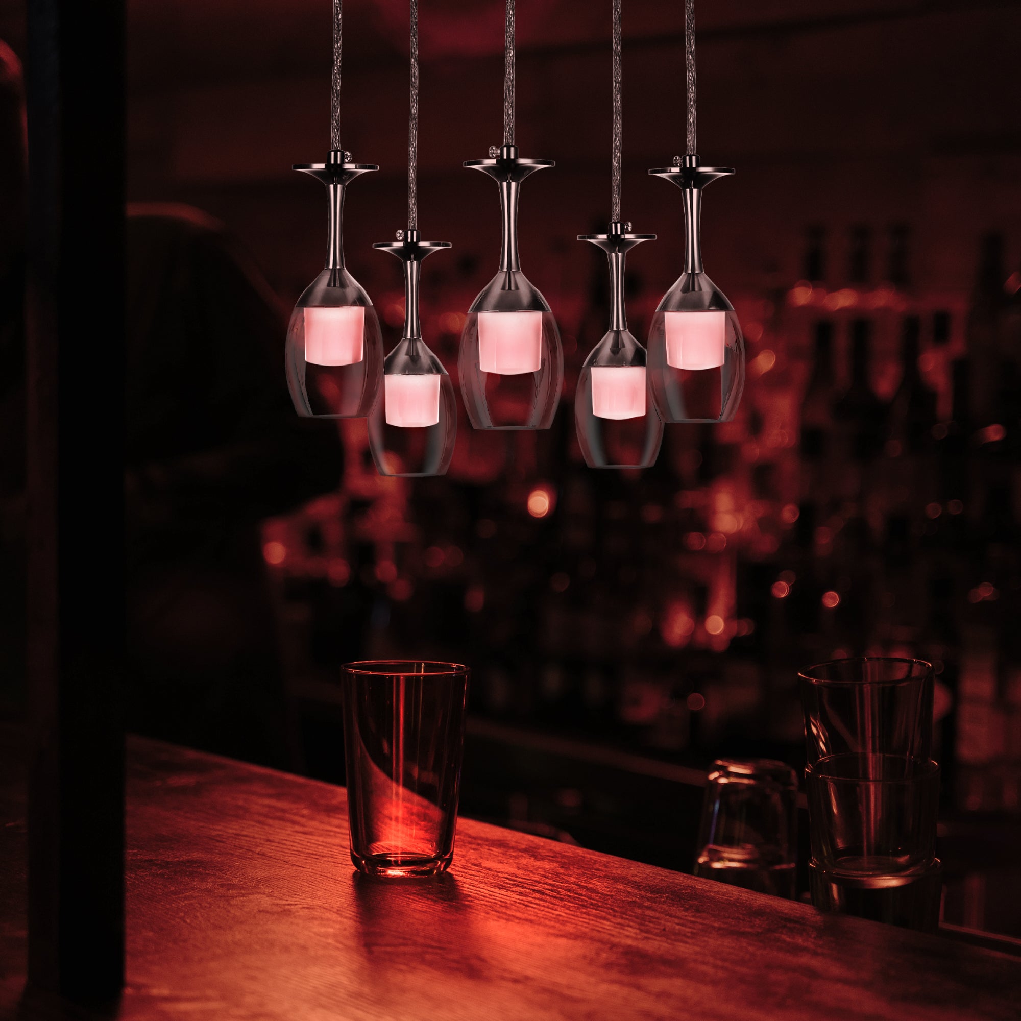 Carro Home Bacchus Smart Pendant Light features a transparent red wine cup shape that creates an eye-catching glow. Bring a touch of glamour to your space with this one-of-a-kind pendant. The five-light chandelier is modern and unique. It&