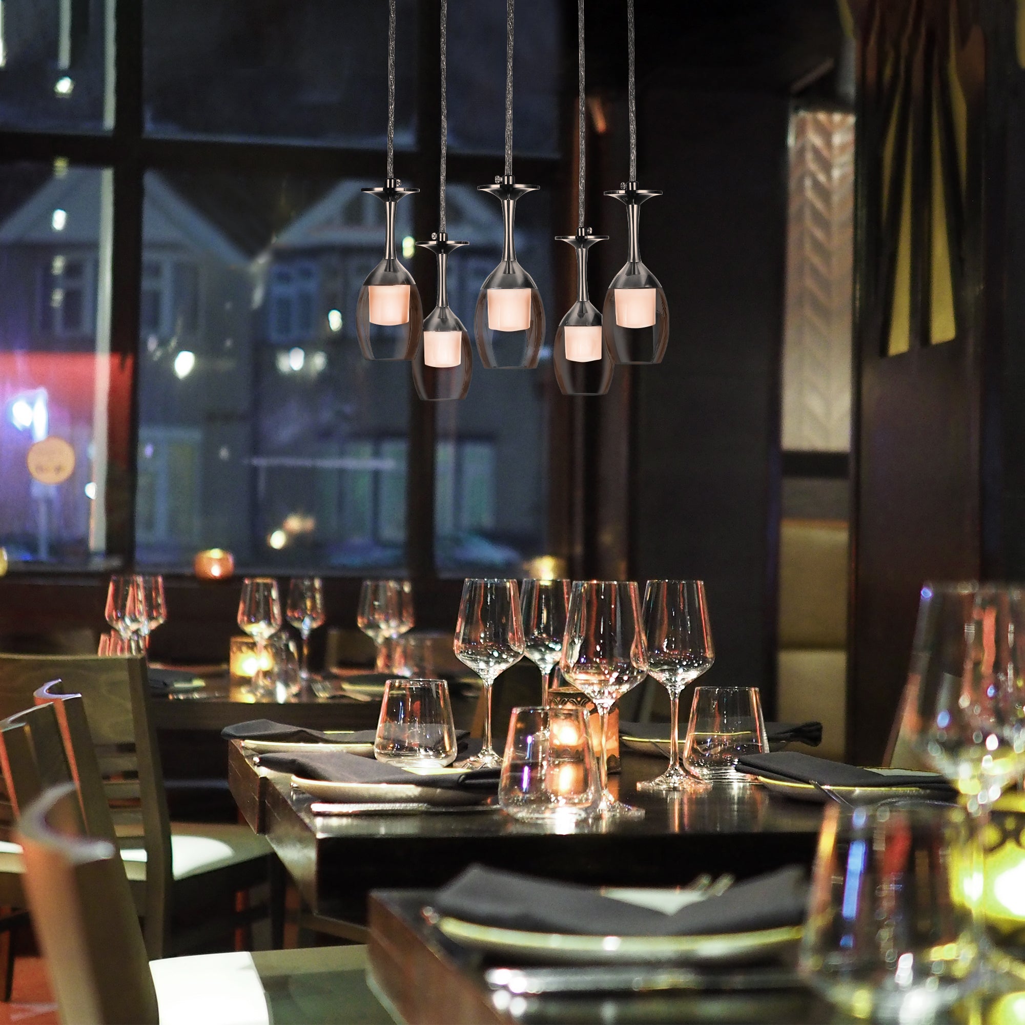 Carro Home Bacchus Smart Pendant Light features a transparent red wine cup shape that creates an eye-catching glow. Bring a touch of glamour to your space with this one-of-a-kind pendant. The five-light chandelier is modern and unique. It&