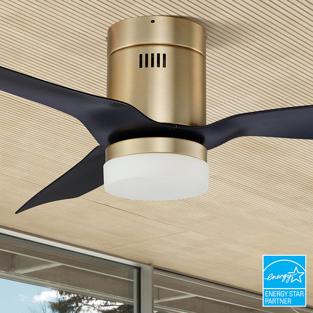 Carro Striver 52 inch outdoor ceiling fan with black and gold design, flush mounted in a smart home.