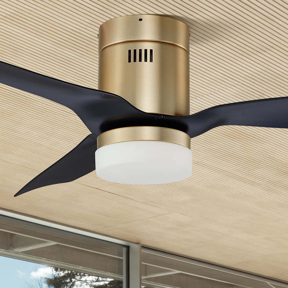 Carro Striver 52 inch outdoor ceiling fan with black and gold design, flush mounted in a smart home.
