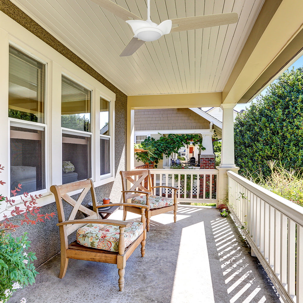 This 52-inch light-wood Innovator outdoor ceiling fan features a modern design and an integrated LED light kit. It is totally damp-rated.
