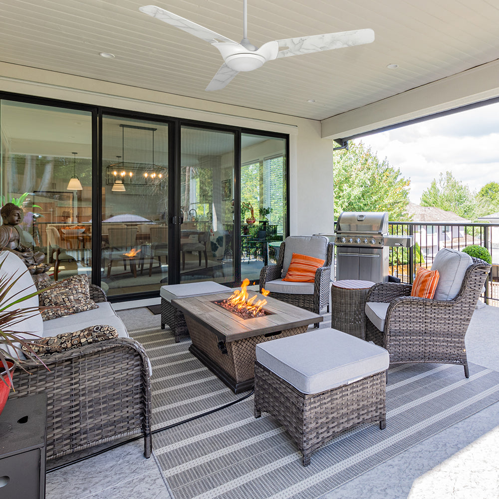 This 56-inch Innovator outdoor ceiling fan in white features a modern design and an integrated LED light kit. It is totally damp-rated.