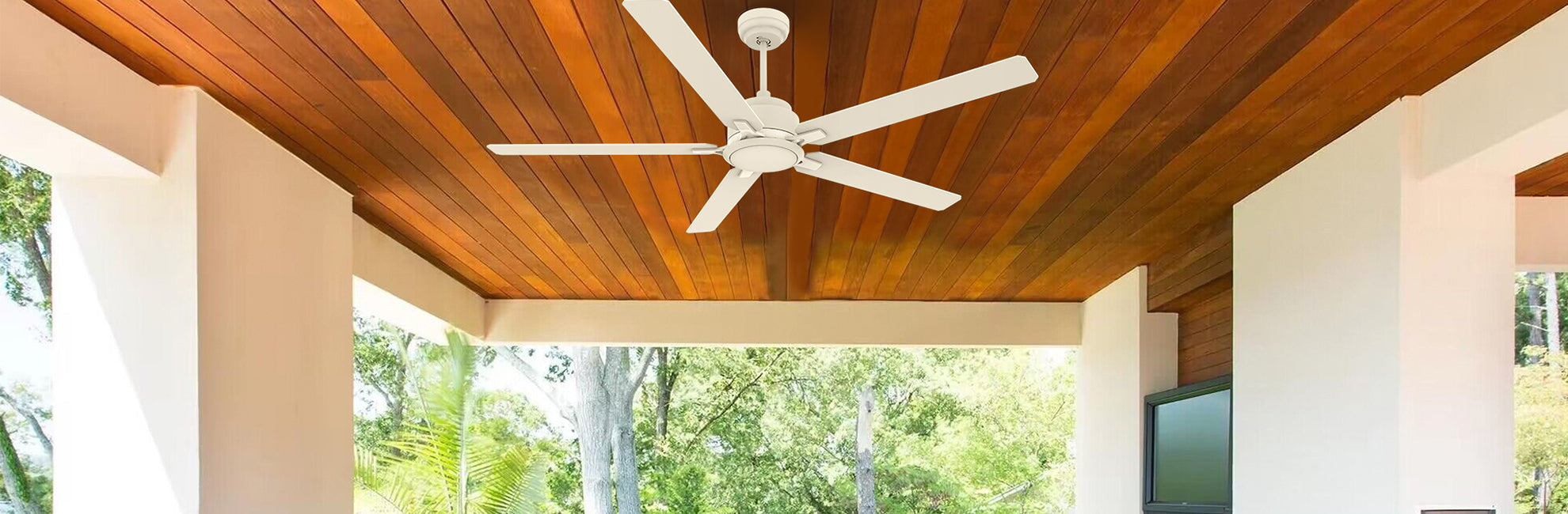 Black flush mounting ceiling fan with light was installed on the top of covered patio
