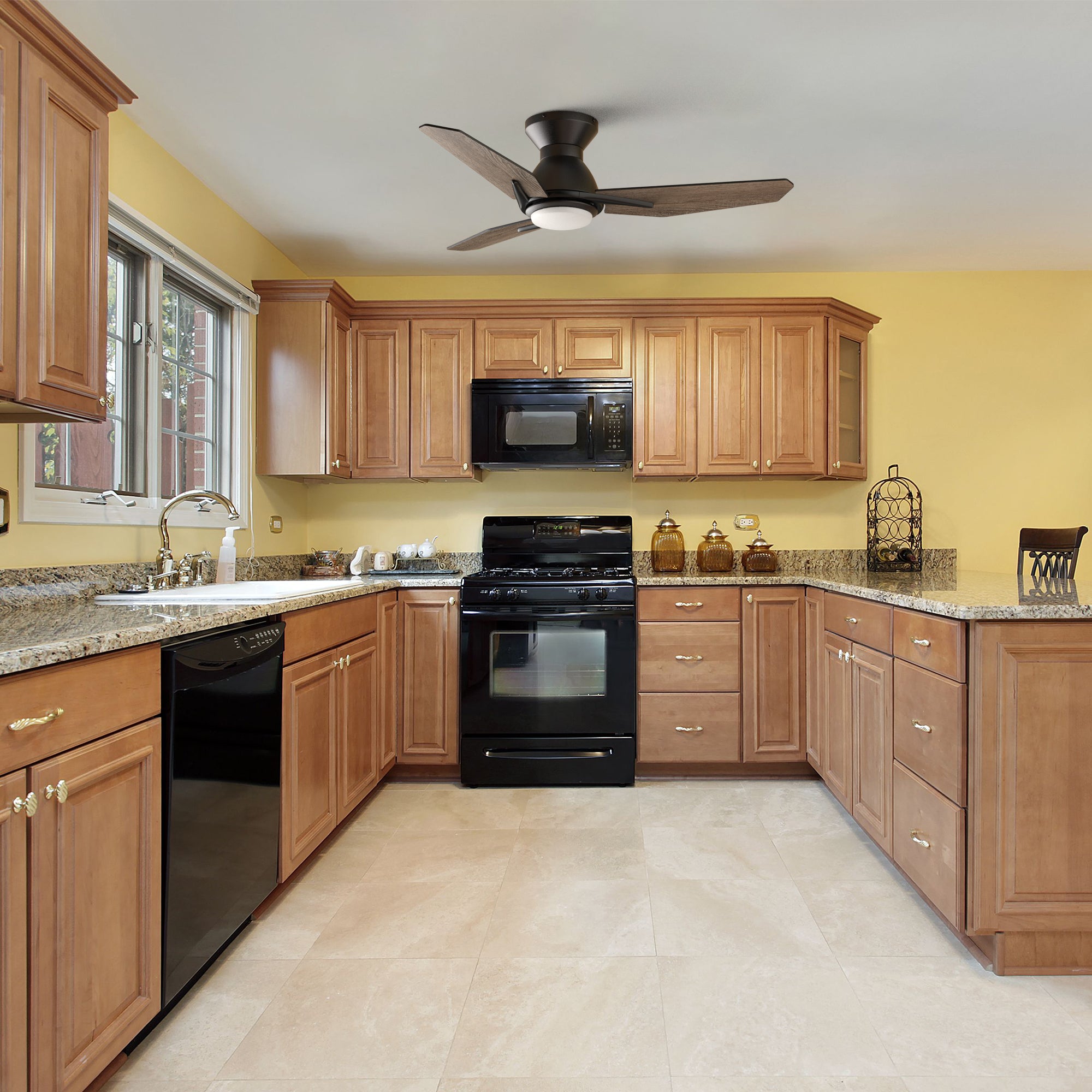 44 inch black low profile small size ceiling fan with led light and remote in modern kitchen.