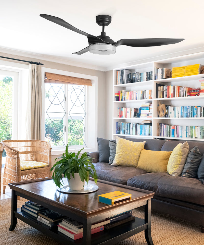 52 inch smart blace ceiling fan with smart and 6000 CFM high air volume in In an intellectual living room with bookshelves.