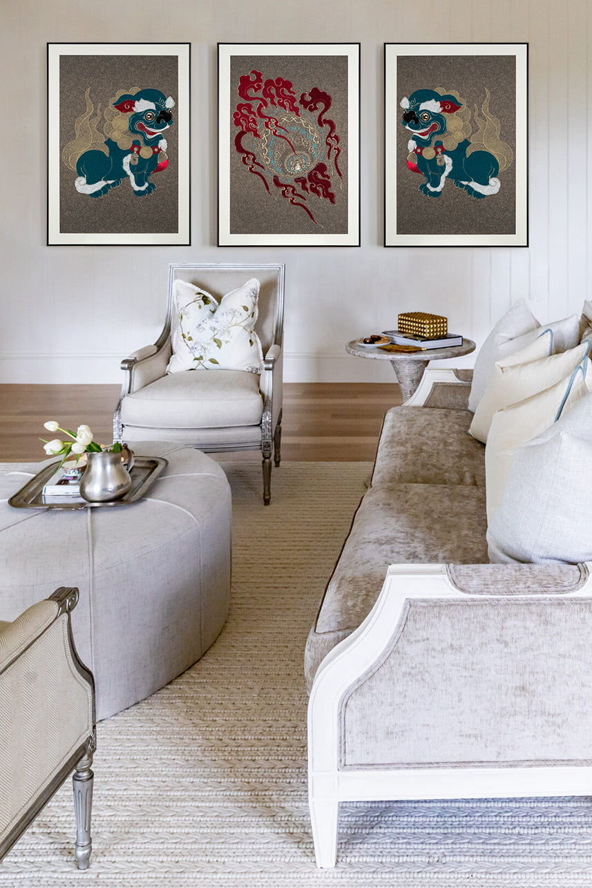 Living room decorated with framed embroidery artwork featuring a lion ball play design. 