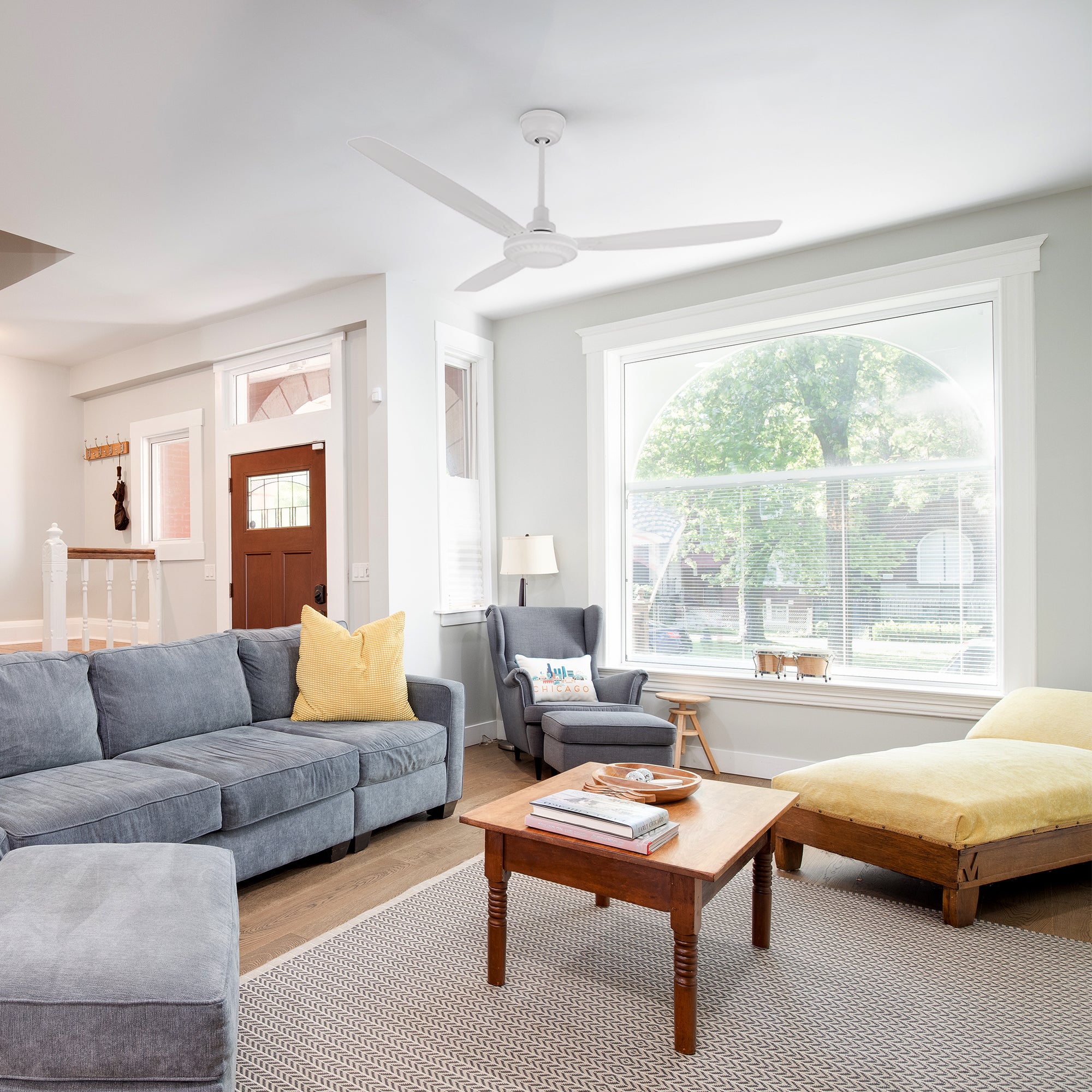 Alya 56-inch white ceiling fan with quiet DC motor in a cozy living room, ideal for modern interiors with 3 blades for efficient airflow. 
